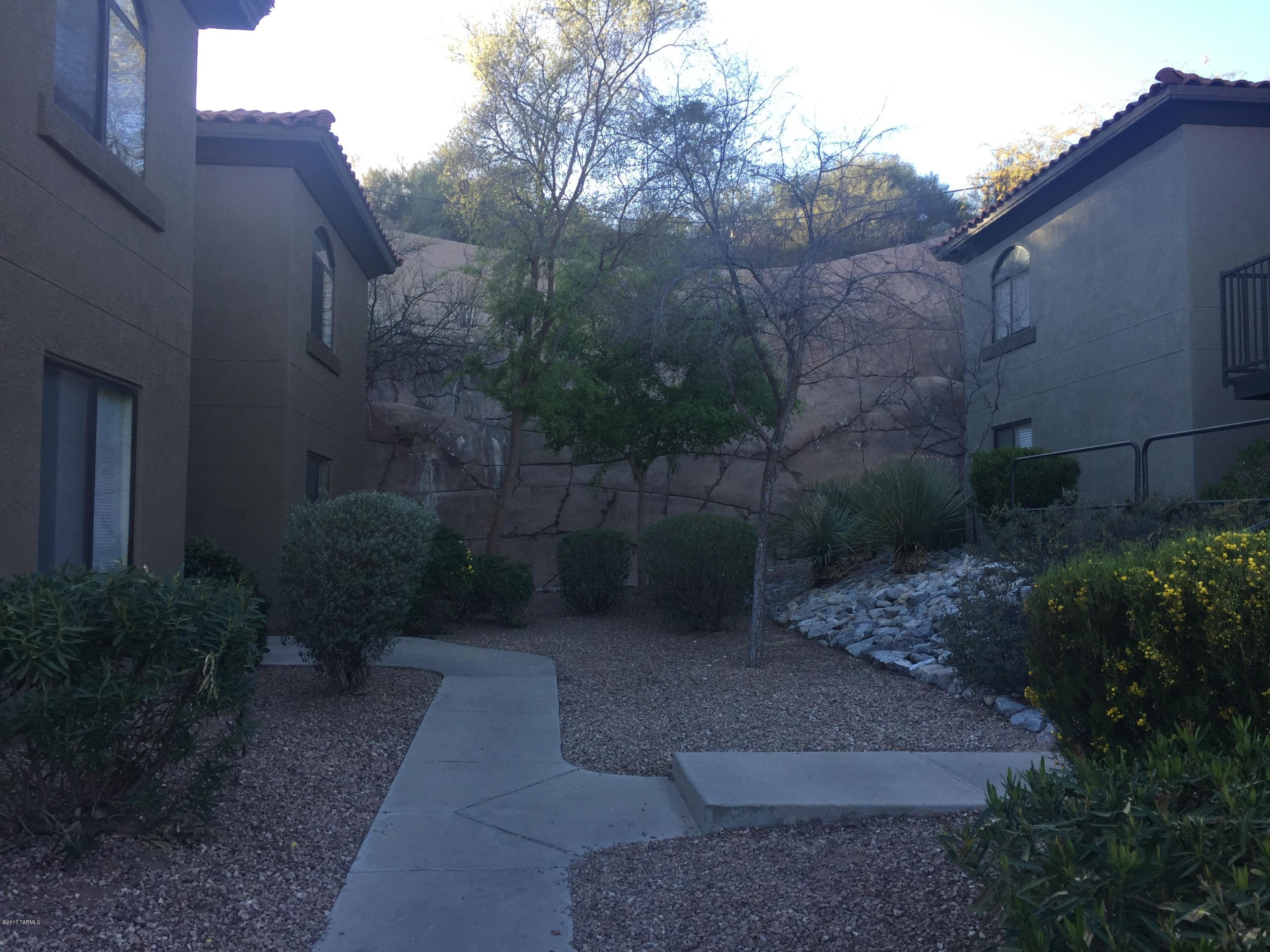 SPACIOUS and hard to find 3 bedroom condo at Veranda at Ventana. Nestled in the ventana canyon area, this gated community features a resort like setting with two pools, fitness center, and manicured grounds. Close to shopping, golf and restaurants. The split floorplan has spacious rooms which each have their own walk in closet.  Private location upstairs, plus new carpet with black appliances