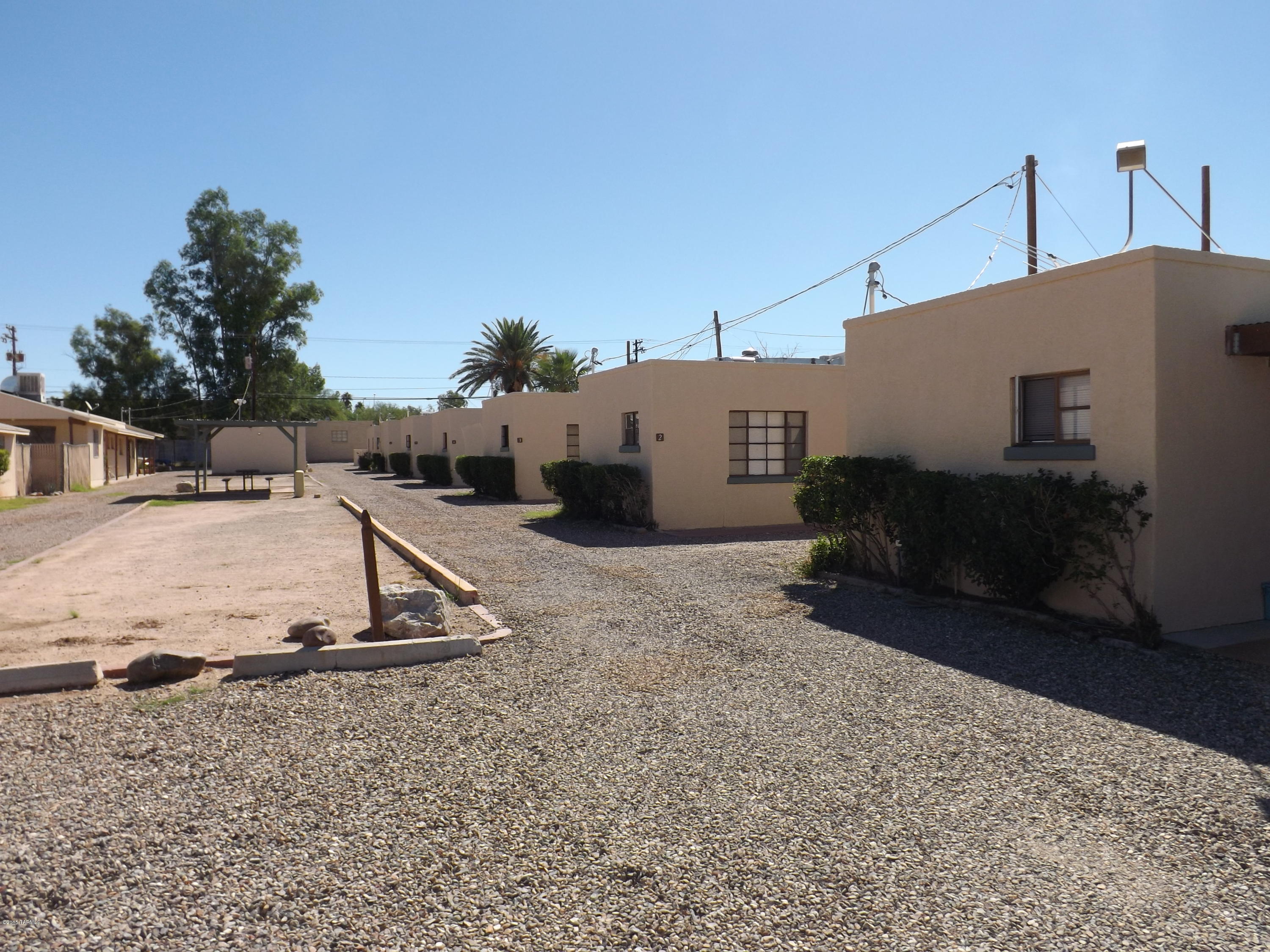 This address is sold together with 2630 North 14th Avenue (107-09-015A) for a total price of $720,000.00.  Total gross rents are $10,629.67, per month (this includes a water reimbursement due to the units being sub-metered for water).  The buildings were built over many different years.  The maintenance figure is inordinately high due to investment (refrigerators, etc) by the owner.