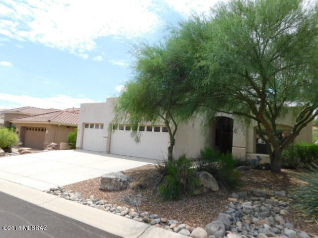 Come see this popular Saddlebrooke Durango model. Bright, open interior with tall, vaulted ceilings. Master bedroom and den downstairs, 2 roomy bedrooms upstairs. Premium and private lot opens up to impressive desert views. Lowest price/Sq Ft in Saddlebrooke by far! This is a real value! Located at 3,500 feet above sea level, SaddleBrooke enjoys mountain breezes that mix with warm desert days and crisp evenings under sparkling starry skies. Deer, quail, roadrunners and coyotes add to the natural beauty of this oasis. SaddleBrooke residents take great pride in our community with its well maintained common areas and amenities.