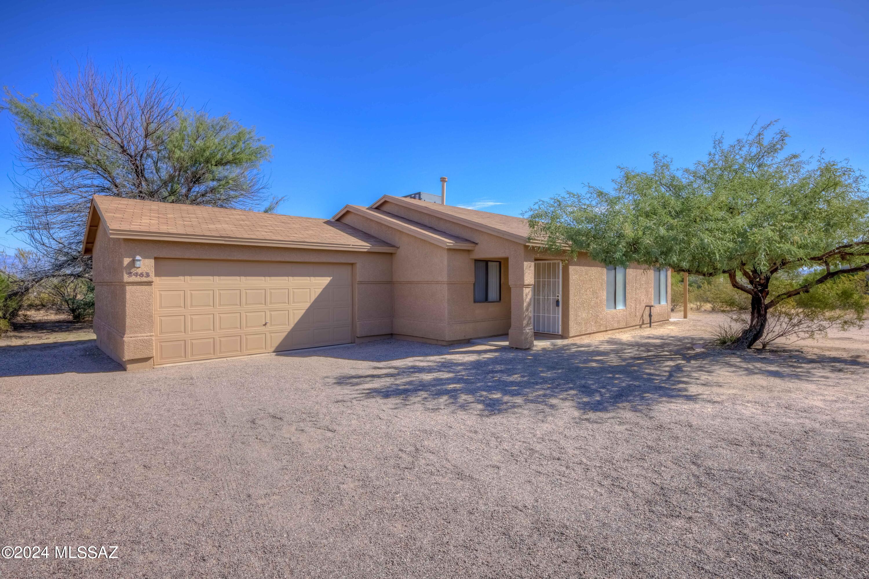 Seller will accept or counter offers between 285K and 299K! Move-in-ready 3 bedroom 2 bathroom home on almost an acre! Minimal HOA fee (10 dollars a month) and CC&R's allow large animals including livestock (check city max on quantity per acre) Fresh exterior paint, new carpet, easy care desert and ample space between neighbors. Massive back yard potential; the lot is flat and usable! Rural feel yet just minutes from all the amenities you need. RV's welcome. No stairs inside and wide open floorplan. Covered patio, two car garage. Hurry!