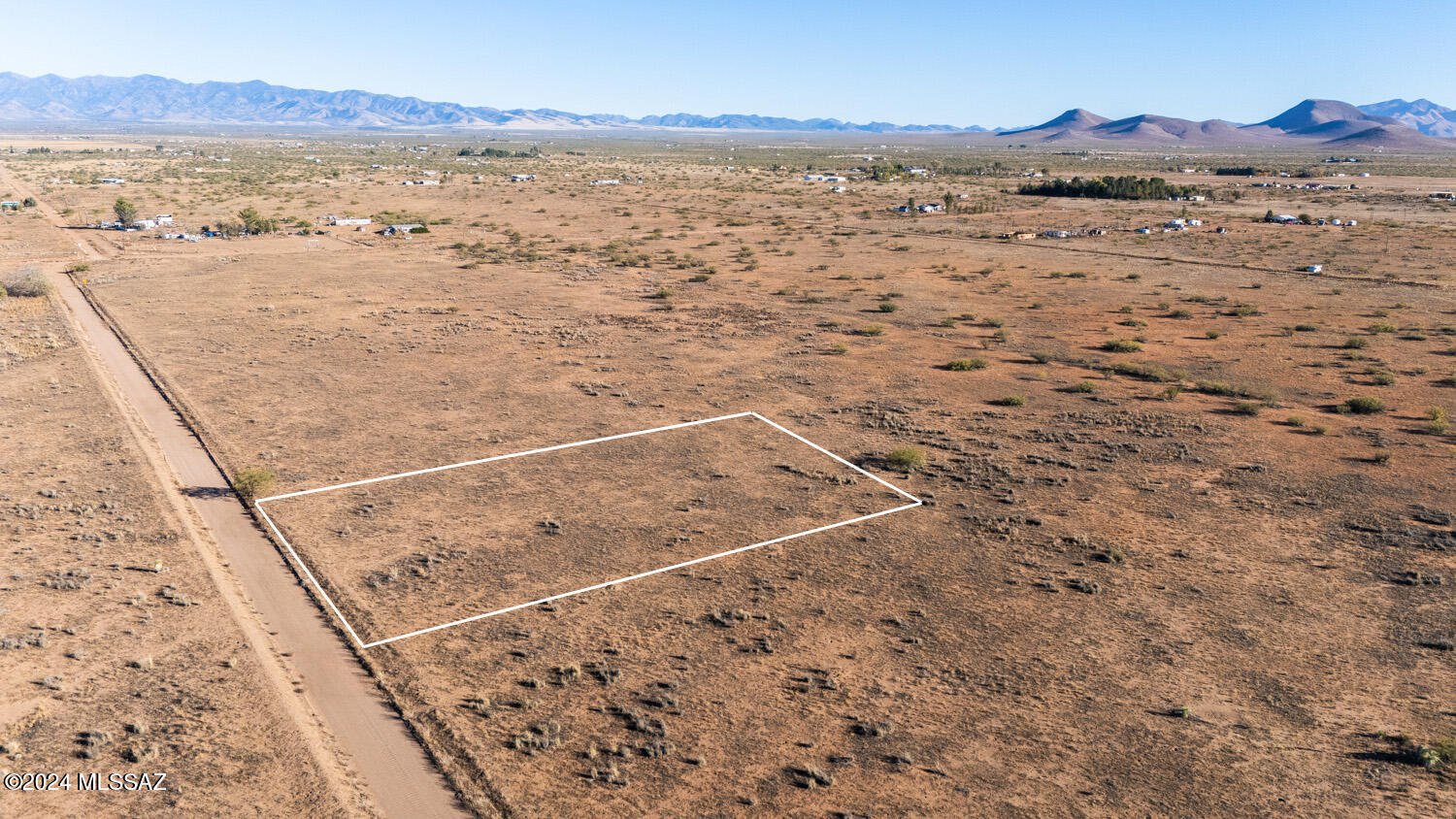This 1.16-acre cleared parcel in the Sunizona region of Pearce, AZ, is primed and ready for building. With easy access and few nearby neighbors, it's the perfect setting for a private country retreat or a serene retirement home. Located at a comfortable 4,500-foot elevation, you'll enjoy temperatures 10-20 degrees cooler than Tucson or Phoenix. Surrounded by the breathtaking Sulphur Springs Valley, this land offers panoramic mountain views in every direction. The area's dark skies provide exceptional stargazing, revealing the Milky Way in all its glory. Embrace the beauty and tranquility of this unique property and envision your new home in one of Arizona's most picturesque landscapes. The adjacent parcel is also for sale (different owner), if you want a larger footprint!