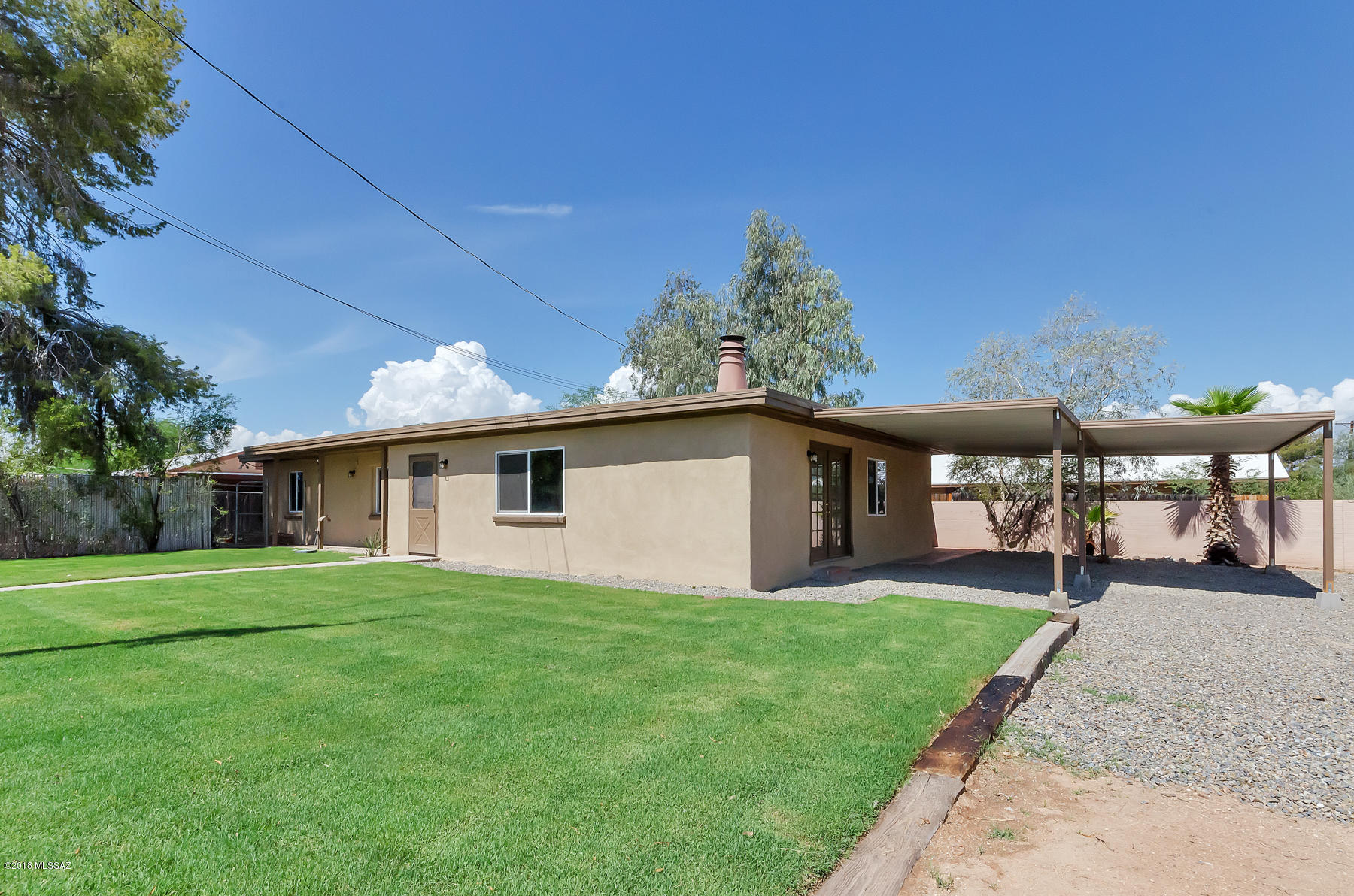 Recently-renovated home is now available! This home includes 3 bedrooms, 2 bathrooms, new carpet, freshly-painted interior and exterior, new kitchen appliances, fully-renovated master bathroom, huge walk-in closet, dual-pane windows, and more! Grass front yard and fully-fenced property with entry gate. Centrally located and only a few miles from the U of A. Owner/Agent.