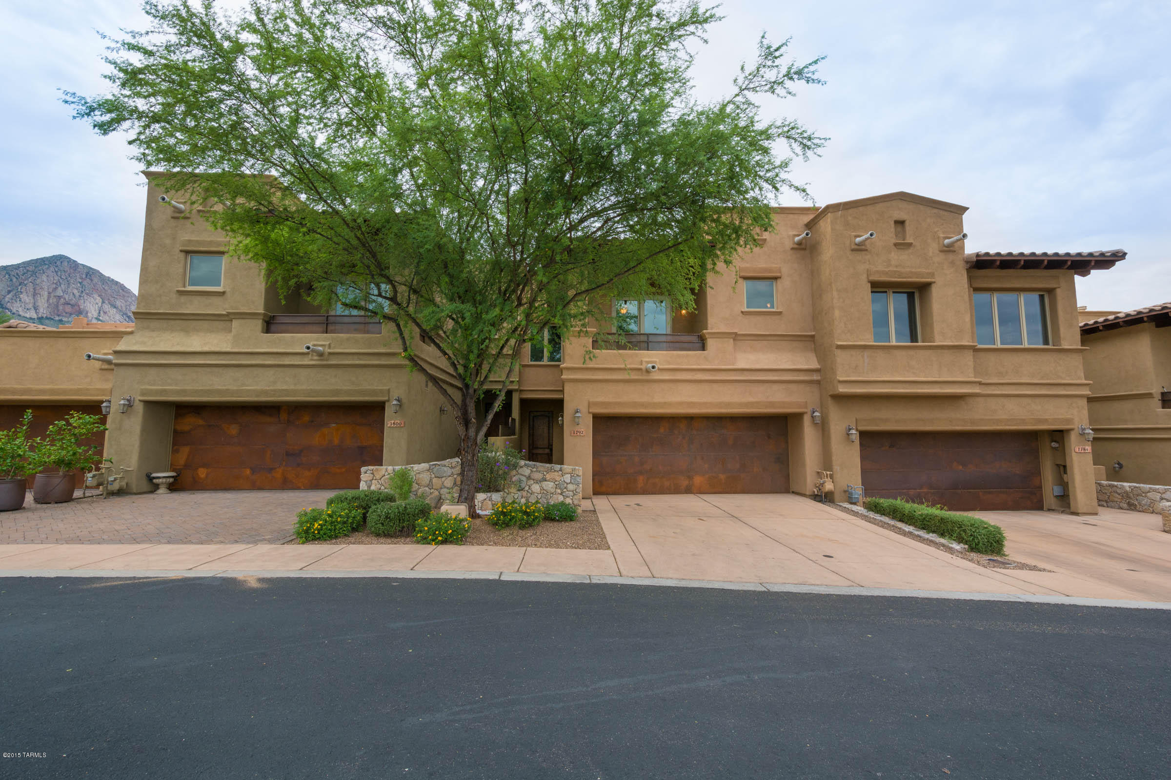 Beautiful, Luxury, Tuscan Villa cradled at the base of Pusch Ridge within Guard-Gated La Reserve! Private enclave of quality constructed Homes by Wilford Construction! Glorious Mountains Views Abound! Surrounded by million dollar custom homes! Loaded w/ upgraded features! Granite Counters throughout, Custom Cabinetry, SS GE Profile Appliance Pkg, 5-Burner Gas Stove, Pendant lighting, Custom Iron Staircase, Wood-Clad Windows/Sliders, Wood Doors, Central Vac System, Alarm, Walk-in Closets in all Bdrms, 2 Balconies w/Glorious Views, 18'' Neutral Tile & More! All Appliances Convey! Large Master Suite w/Balcony & His/Her Dual Lavs, Spa-Like Garden Tub & Separate Walk-in Shower! 3rd Bedroom makes Great Den/Office! Private Community Pool w/Mountain Views! Hand-laid Rock Walls & More!