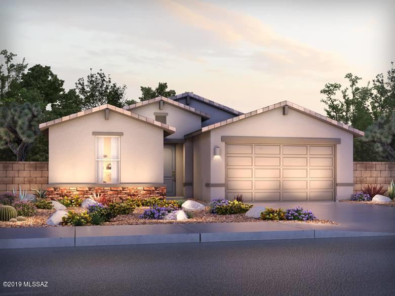 Brand NEW energy-efficient home ready Dec-Jan 2020! Open space behind homesite. Kitchen island with Carrera Breeze quartz in gourmet kitchen with Tahoe Harbor cabinetry, large master suite with generous walk-in closet, laundry room with space for cabinetry, 6X 24 tile throughout home except for bedrooms. The large great room is a beautiful space for lounging with the family, watching TV or entertaining. The owner's entry just off the two-car garage offers a great space for unloading groceries or sports equipment after practice. Paseo at Linda Vista will offer residents a beautiful community with an abundance of mature desert landscapes, highly-rated AMPHI school district and easy
access to employers. Known for their energy-efficient features, our homes help you live a healthier and quieter lifestyle while saving you thousands on your
utility bills.
