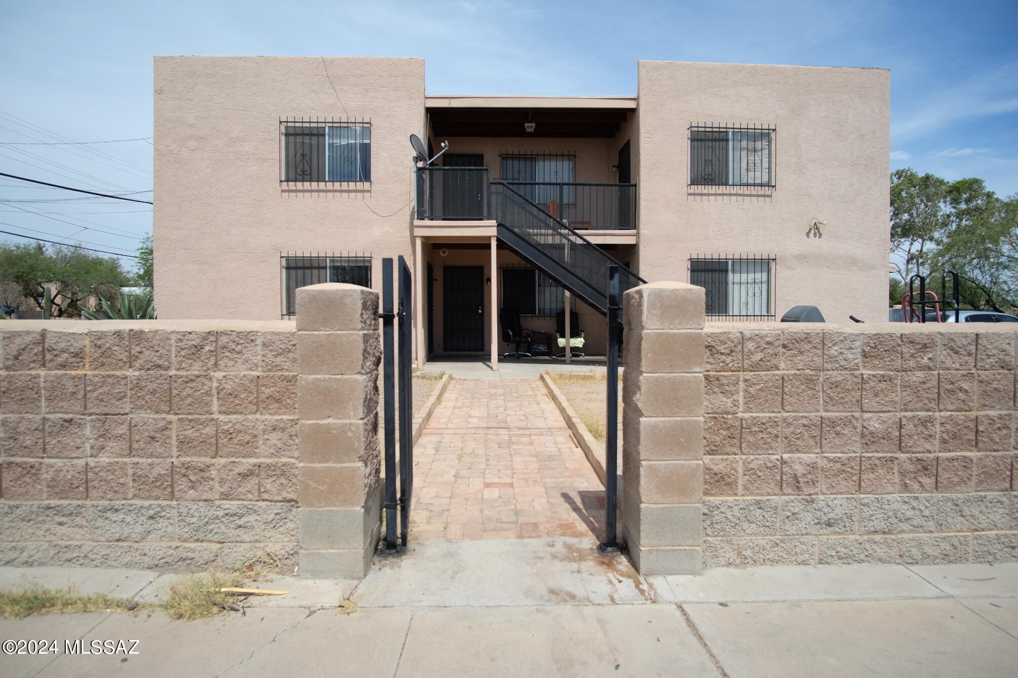 Text for a walkthrough video/more info. Balboa Heights upper level 1 Bedroom (no closet)/1 Bathroom unit with central evap cooling, fresh paint throughout, updated appliances, walled & gated front yard, ceramic tile floors, and Central Location close to I-10 & Public Transportation. No laundry hookups, off-street parking in shared lot. No Laundry Hookups available. 12mo minimum Lease, Costs are: Non-refundable $50/adult Application, $825 Security Deposit, $150/pet with approved pet, $250 cleaning. Sewer/ and trash included in rent. Tenant pays electric and water. Available immediately.