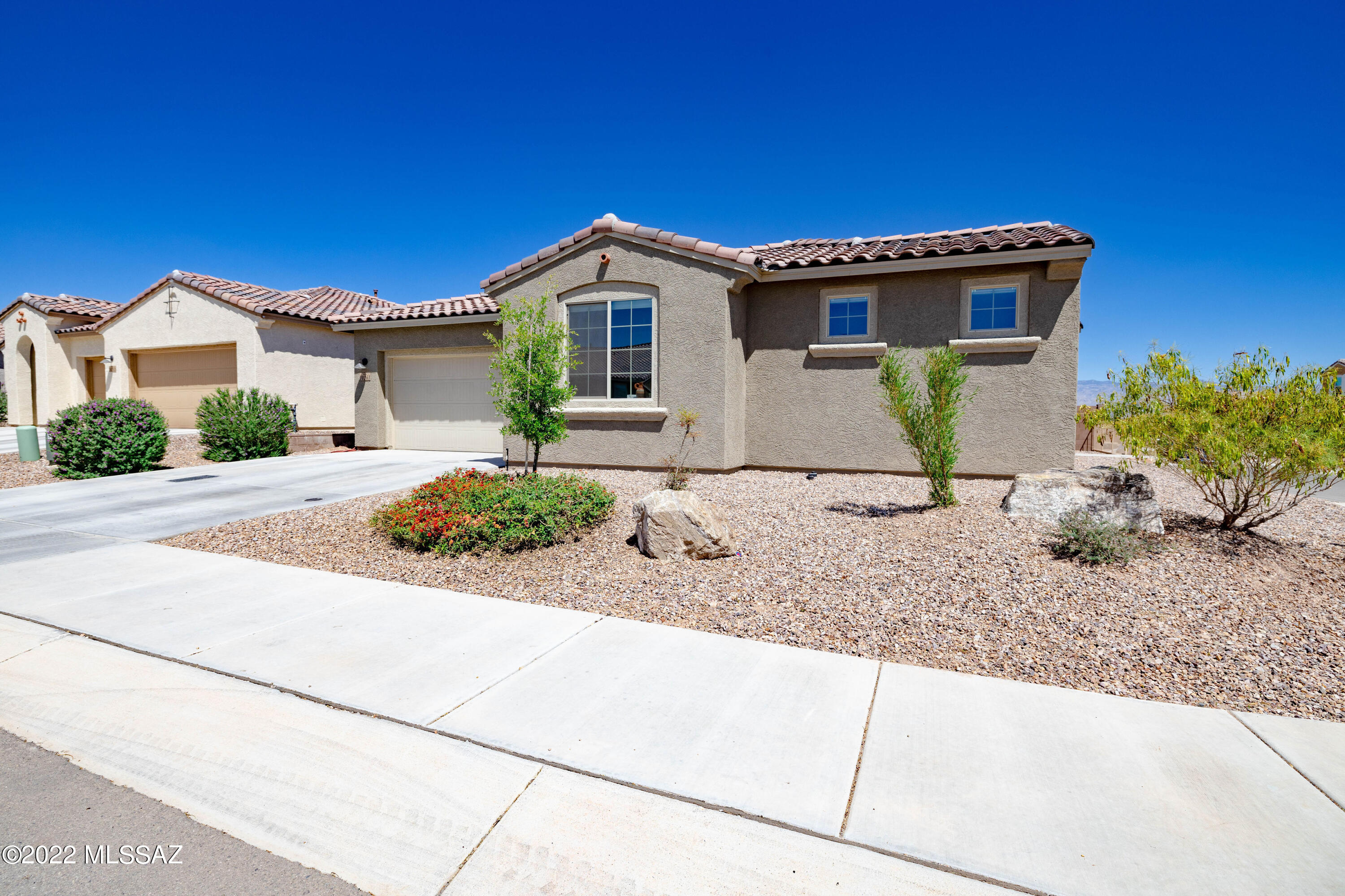 Fantastic opportunity to move right in to this Ocotillo floor plan that has it all! Gather around the spacious island in the Gourmet kitchen with granite counters, stainless appliances and upgraded cabinets. Speaking of cabinets, there are cabinet upgrades throughout the home. The luxurious master suite has a super shower, dual vanities and more. Outside you will find artificial turf, pavers galore, built in barbecue, spa and a fire feature. Make this your new home today!