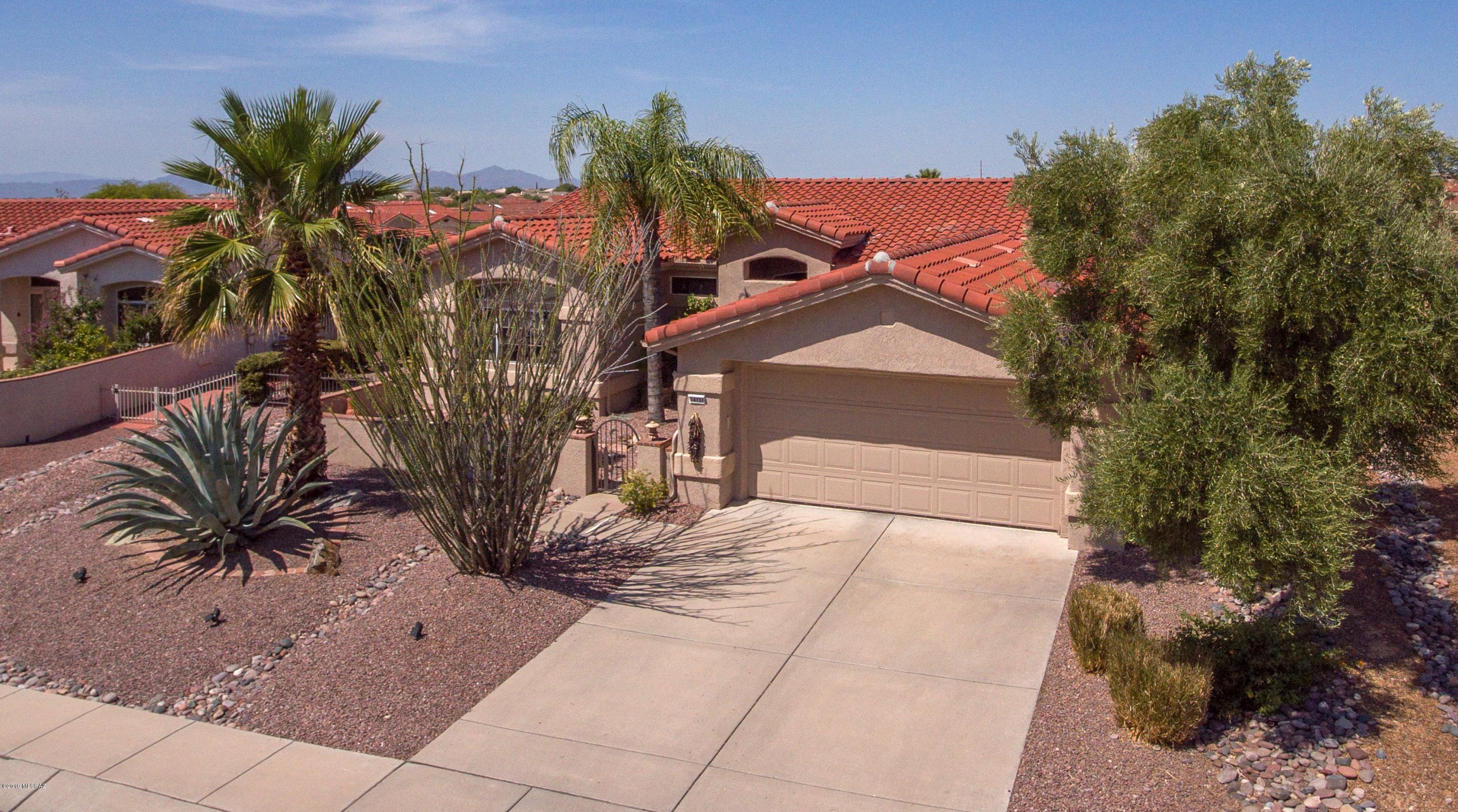 Lovely 2BD/2BA + Office (1,824 sq ft) home in Sun City Vistoso boasts Solar power and Pusch Ridge views from gated front courtyard and SE patios. Inviting living/dining room hosts a wall of windows w/French doors. Chef's kitchen offers plenty of cabinet/counter space plus adjoining breakfast area and Family room w/fireplace. Spacious Master suite features a luxury bath and dual closets. Oversize ceramic tile, wood slat blinds and designer colors. 2-car garage has large, enclosed laundry room while well manicured rear yard and gated side yard feature brick paver patios. Sun City Vistoso's active adult community is steps away from a championship golf course, state-of-the-art fitness center, tennis/racquetball courts, 6-lane pool, pickle ball, library w/computer and artisan center. Views!