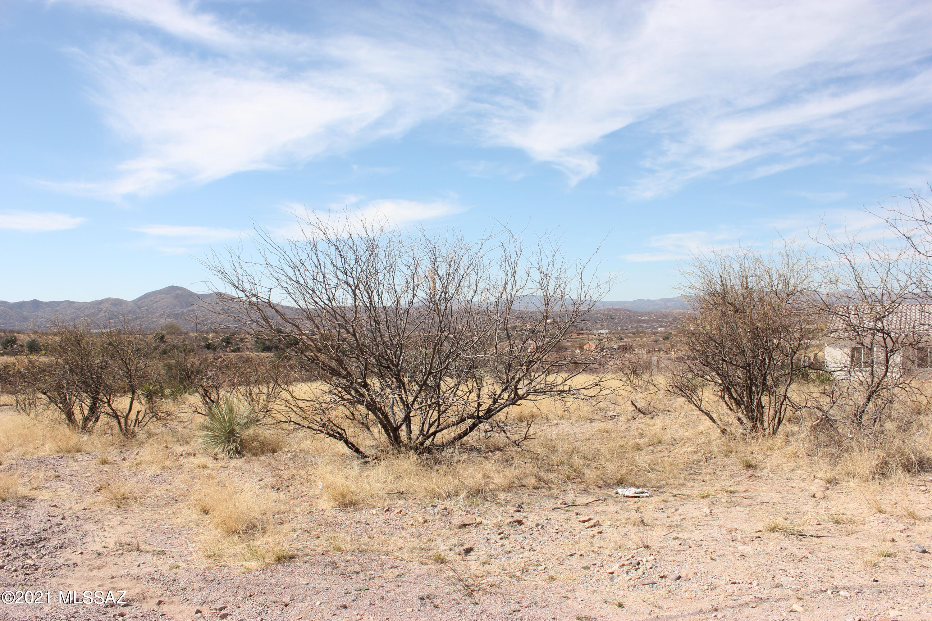 Nice residential lot with mountain views located in South East Rio Rico.  The road is paved until you get to Cocula Ct.  Electric and water service is at the street (homes on both sides) the lot will need a septic system and has not had a percolation test done yet.