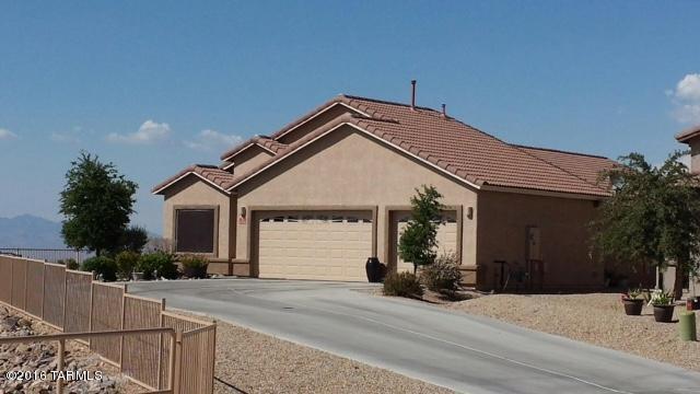 Unique & beautiful ready to move in home in neighborhood with unobstructed mountain & desert view with amazing sunsets. Non-smoking, clean, ready to move in, 4bd, 2 bath home, 1886 sq. foot, with 2 living areas with spacious garage and 110 foot driveway in Sycamore Canyon, Vail, AZ. New home in 2009 with lots of upgrades and PREMIUM lot: Security screen door on front, timed irrigation, H20 softener, epoxied and painted 3 car garage with 4 foot extension, Jack & Jill bath, extra cabinets in laundry room and master bathroom, ceiling fans in almost every room, 110 foot driveway with lots of parking, desert landscape in front and back, backyard is newly landscaped with electrical outlets, low voltage lighting in curbing, natural gas lines ready for use, flagstone patio, screened in patio.