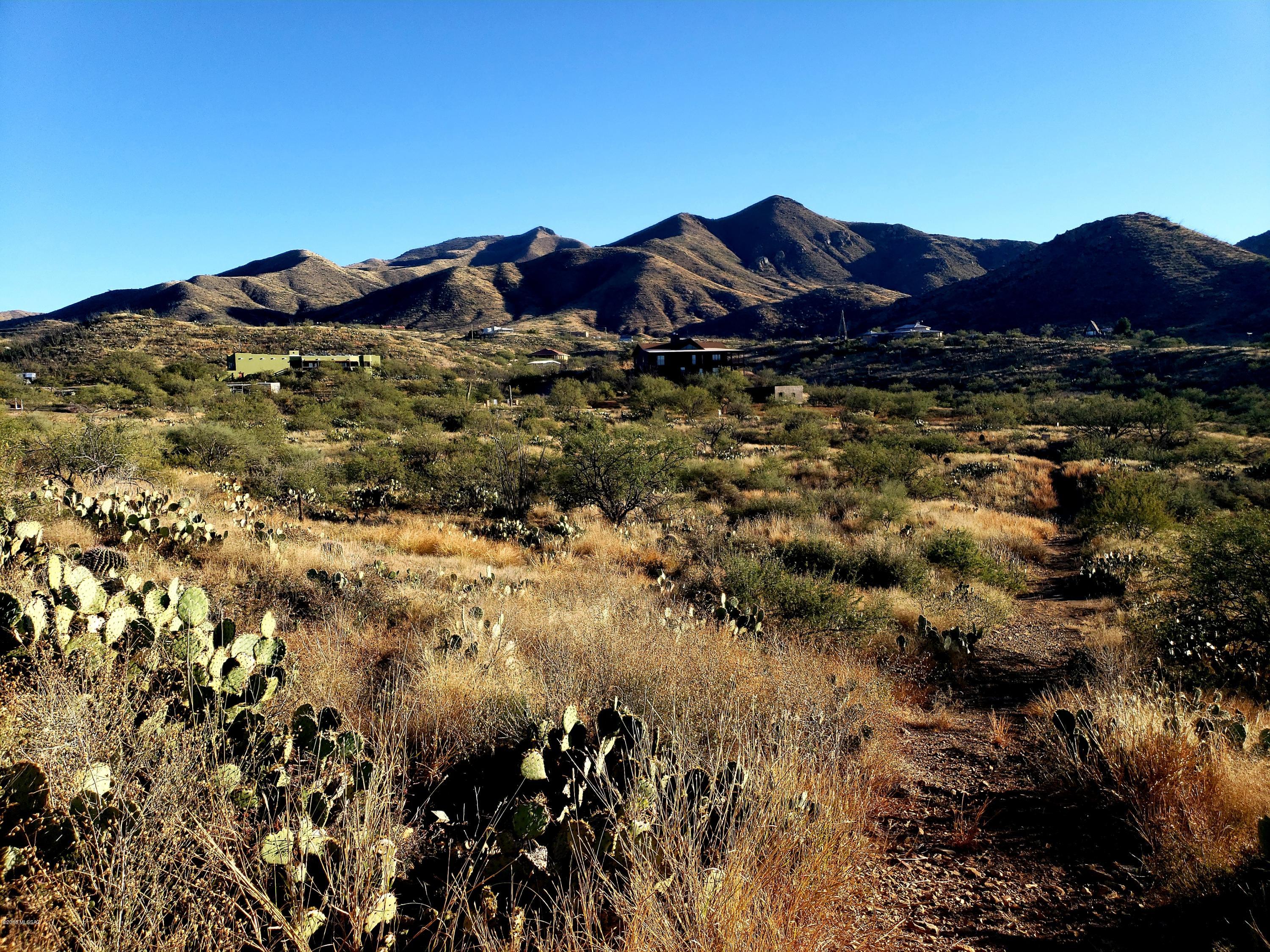 This lot has a large building area at the top which is located on the north end of the parcel. Build a meandering driveway to the top to take advantage of the PANORAMIC VIEWS. My sign is located on Camino Aurelia next to a trail that takes you to the top of this lot where the views are. Unfortunately, Mt. Fagan Water Co-op is at full capacity and can no longer add new customers so a well will need to be drilled.