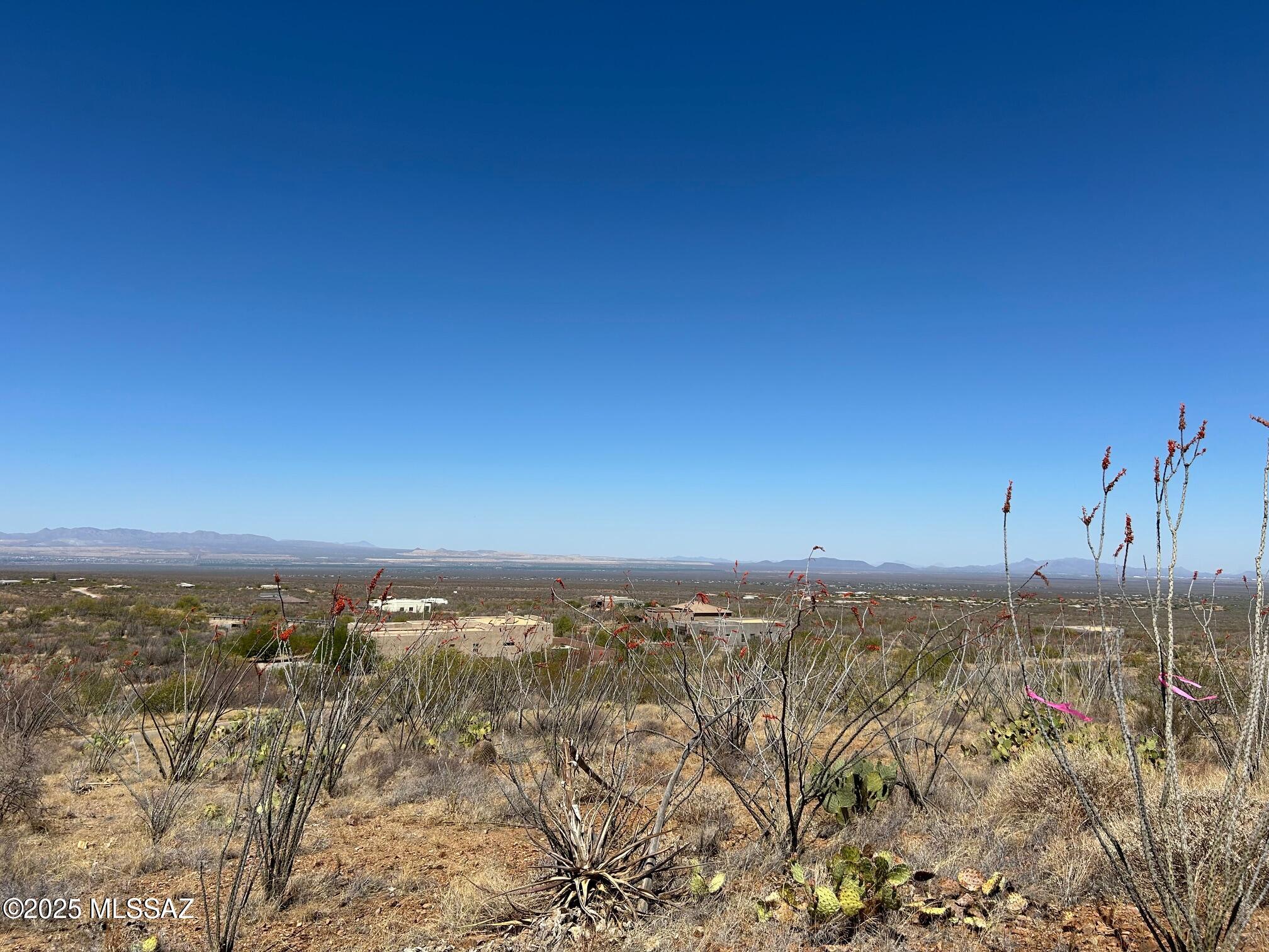 SWEEPING, PANORAMIC VIEWS of the ENTIRE TUCSON BASIN from this gently sloped RIDGETOP site. High above the neighboring site to the south, enjoy these 360 degree views of city; lights and the BEAUTIFUL SANTA RITA MTNS. All lots are 4.17 acres providing for great home separation and lots of natural open space surrounding homes. Underground water, electric, gas, phone and cable along with paved access add to the allure of this FOOTHILLS SUBDIVISION at the base of the Santa Ritas. This is one of the DEVELOPER'S last 5 lots just put on the market; all priced between $149,000-$164,000. Build among Million $ plus homes. See documents for useful information. Call to meet LA on site and walk them all/