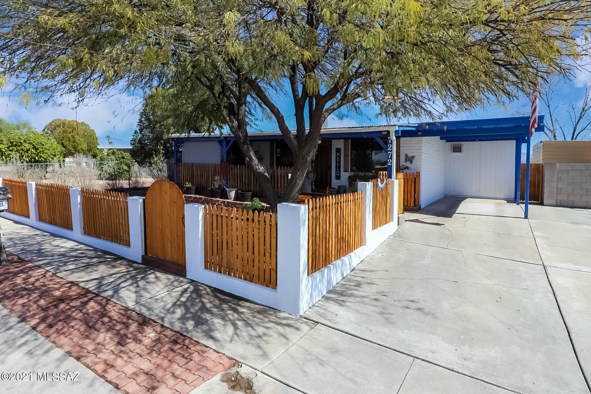 The most darling front porch, mature trees and a wood picket fence are just the start of this perfect sized family home in a well-established Eastside neighborhood. No HOA or neighbors behind you! Recently recoated Roof, 2018 HVAC + electric panel upgrade and improved bathrooms are just some of the extras on this well maintained home. Plenty of cabinetry & countertop prep space in the extended Kitchen with a mini fridge that was remodeled a few years ago plus two(2) AZ rooms, separate storage/workshop space and a recording studio that give you ample room for any hobby that you might have. Make an appointment quickly before this captivating home is gone!