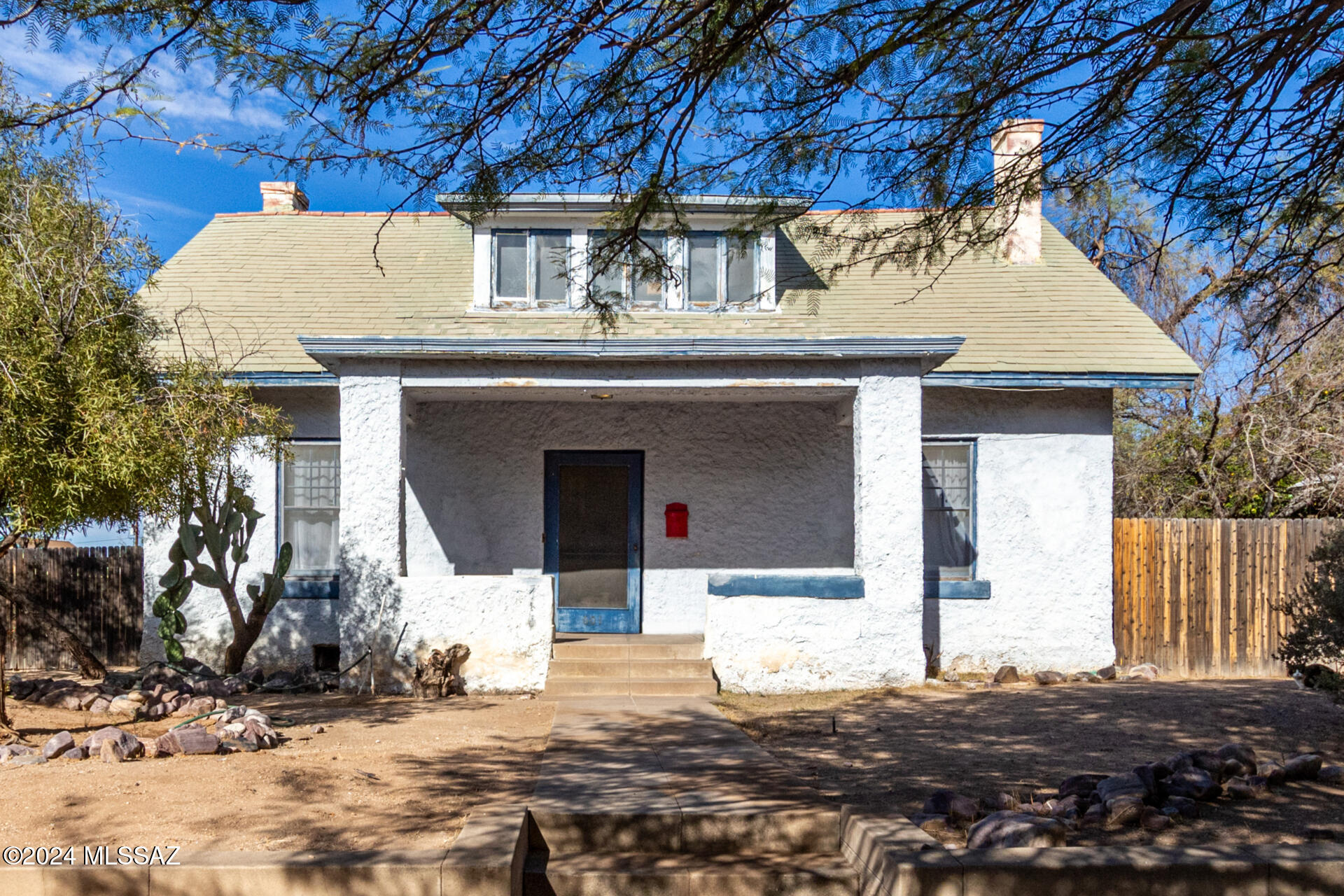 Historic 2 story Craftsmen Gem; located by the UofA & Downtown walking distance from park & shops in Historic West University neighborhood.  Inside is loaded with historic charm. Notice original: hardwood flooring, windows & casing, cozy fireplace, book cases, wood beams, craftsmen doors.  Formal dining room is spacious and opens to living rm. The kitchen provides built-in appliances and plenty of cabinets & cupboards topped with crown moulding. Continue upstairs to find a flexible loft and bright bonus rm that can be used as an office, reading nook, or additional lounging space. Large main bedroom offers vaulted ceilings & a sitting area. Spacious backyard, includes an RV gate, antique garage, ramada, & a refreshing pool for endless summer fun. Perfect for a buyer looking for a project. Great property for someone looking for a project and a labor of love.  Historic tax breaks exist for owner occupied properties and historically renovated homes. Home has a crawl space.