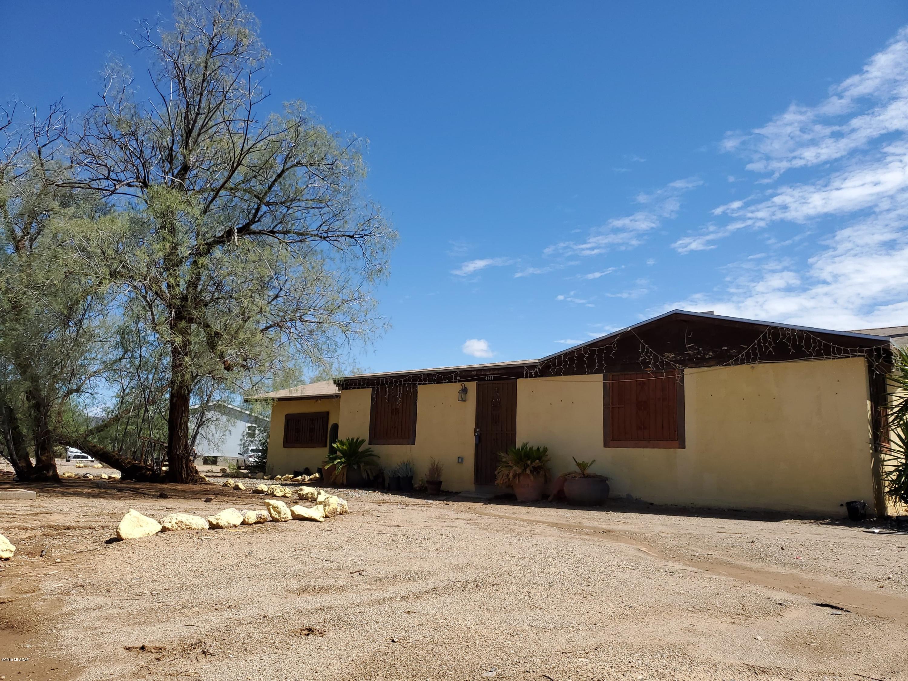 Great 3 bedroom 1 bath slump block home on 1.44 acre horse property. Perfect place to enjoy the tranquility and beauty of our Sonoran desert.  Plenty of space to expand and make this home your own.
