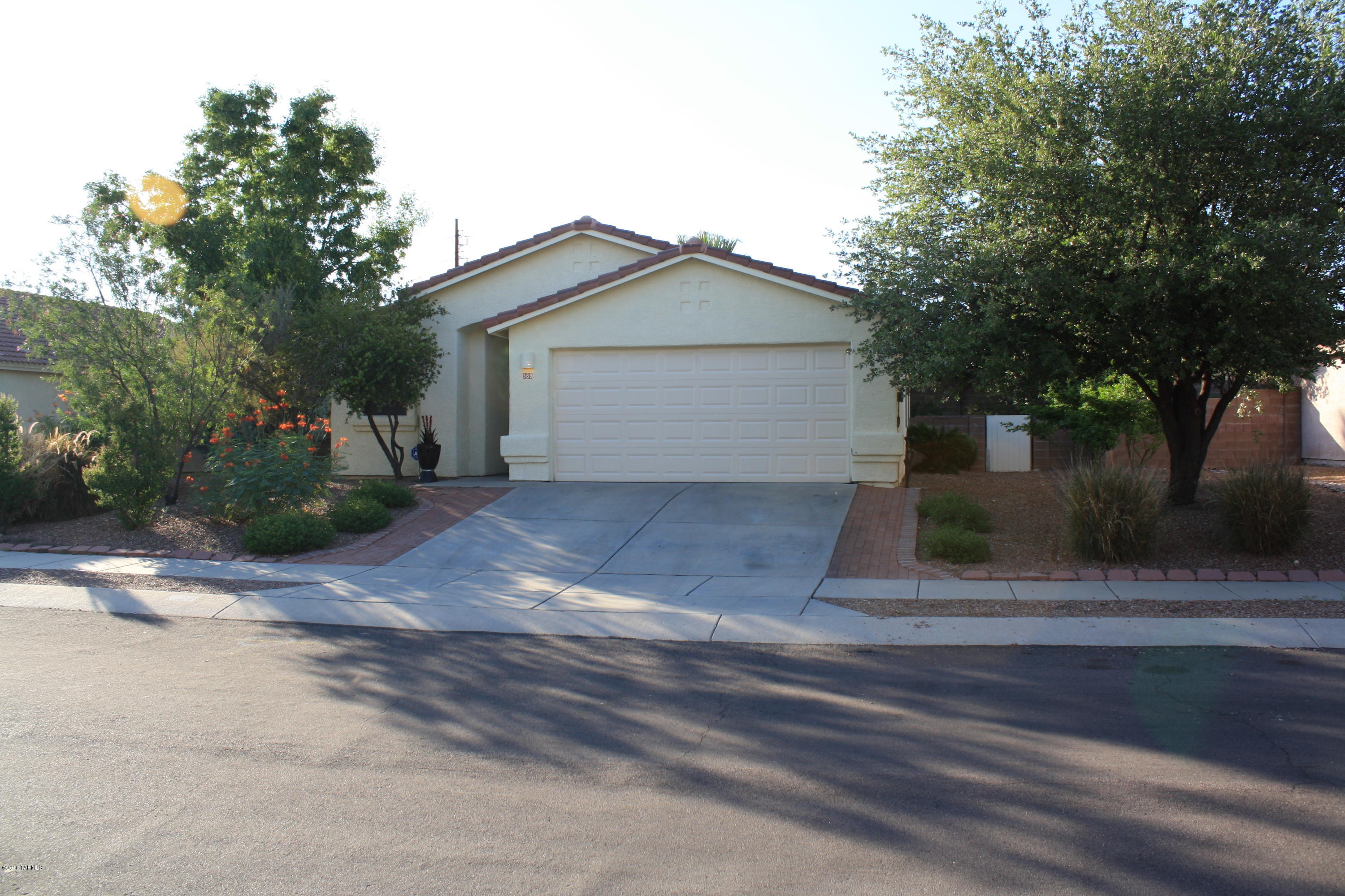 Gorgeous 3 bedroom in popular Rivers Edge subdivision. Features updated kitchen with granite, stainless steel appliances, backsplash tile, undermount sink, custome window treatments, Pergo floors, tile, upgraded neutral carpet, fireplace, security front door, irrigation and beautiful backyard with mountain views. This is a smoking-free and pet-free home. Bathrooms have upgraded cabinets. Master bedroom walking closet has built in drawers, and garage plenty of built in cabinets.