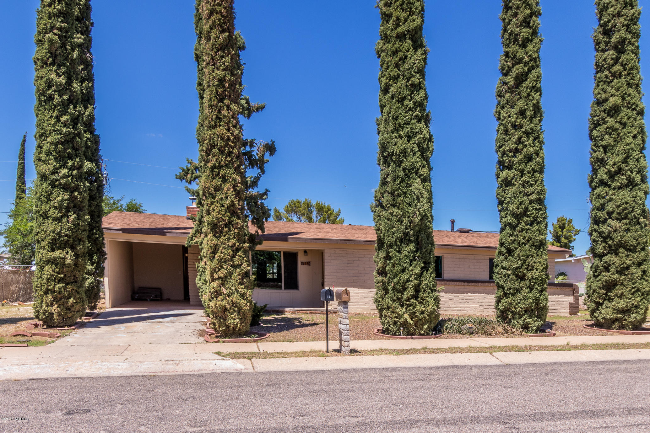 Due to buyers financing falling through we are back on the market.  Rare remodel in Corona.  This 3 bedroom 2 bath well laid out home has been retrofitted with new wood plank tile, new paint, new custom kitchen, new roof and new electric and water fixtures thru out.  Spacious yard with curb appeal.