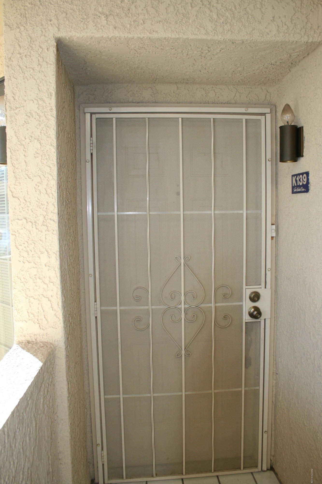 This beautifully maintained move-in ready condominium is ready for occupancy. A fantastic location, close to UA, Banner Medical Center, farmer's markets, and Tucson's ''Loop'' used for cycling, running and walking is close to your front door. Condominium features are a great room, with coffered ceilings and high windows, fireplace, split bedroom floor plan, 1 3/4 bathrooms, and two patios. HOA covers community pool, spa, landscape, exterior maintenance, recreation center, water, sewer and trash. One dedicated covered parking space is included.