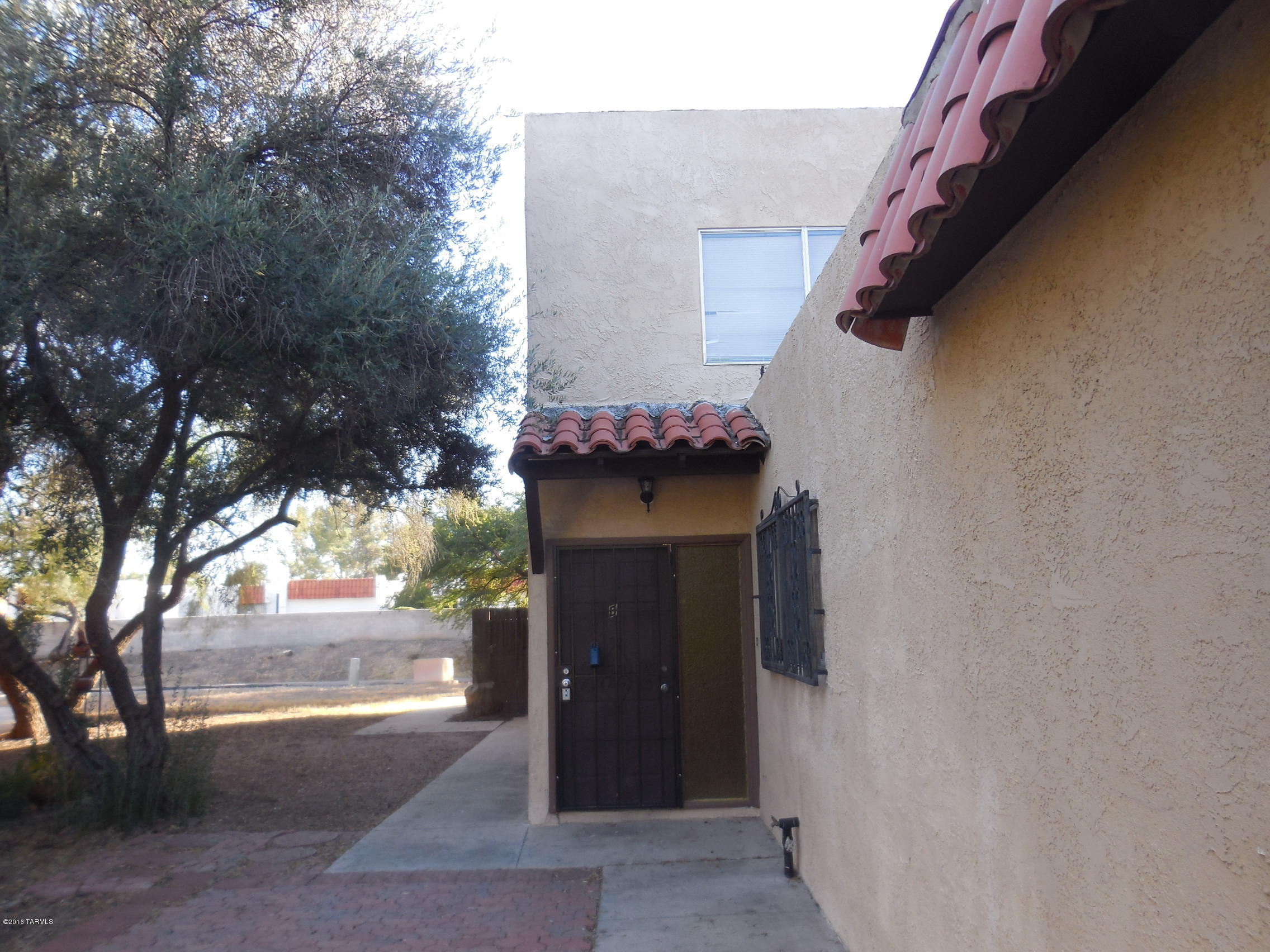 ESTATE SALE - Very lovely complex with maintained grounds.  Condo has access to two gated community pools and each building has it's own laundry room.  Covered 1 car carport as well.  Prime location for several top rated restaurants, etc. This property needs some dry wall repair and partial kitchen but check this property out for value.  A new way of life awaits you in this charming neighborhood.  Sold AS IS and no SPDS/CLUE REPORTS.
