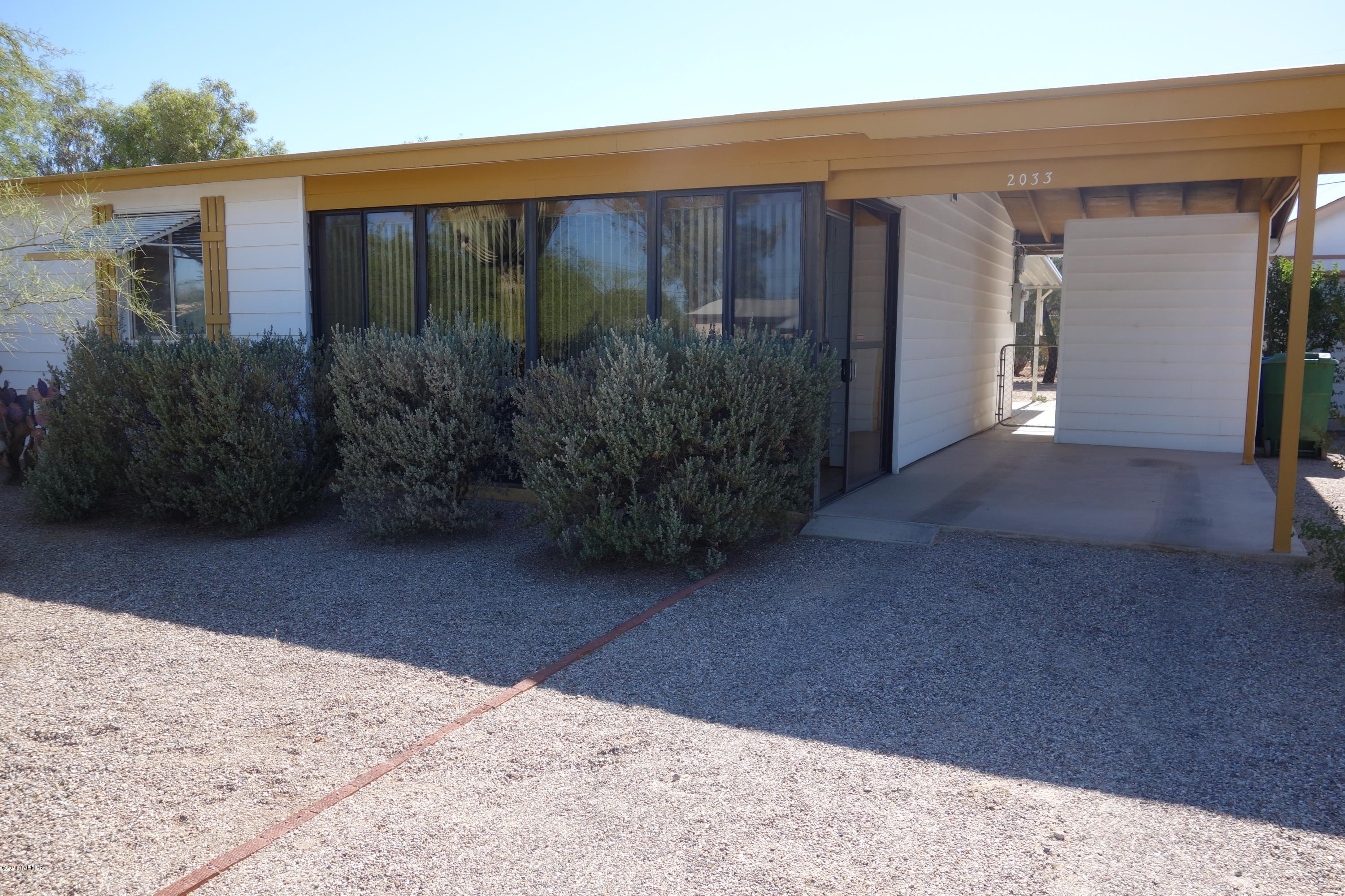 Super home for sale by original owner. 1 car carport plus 12 x 24 garage. Fresh carpet and paint, large covered patio, remodeled bathroom.  Well insulated and has dual pane window.  Gorgeous landscaping, mature trees, fenced yard, and great central location near all amenities including shopping, schools, library, bus routes and more.  Taxes are currently based upon widow exemption. Don't miss this one.