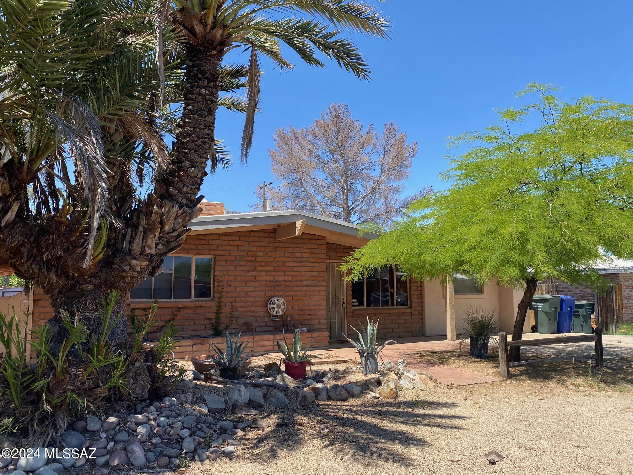 Location,Location,Location! This home has a new upgraded electric panel to service the BRAND NEW heating and cooling system, new flooring, new interior paint and a new roof! All this house needs is a new owner to put their style on the kitchen and baths.
This 2 bedroom/2 bath adobe home also has a built ins and a bonus room for the appreciated extra space. The wood ceilings thru out add to the appeal of this
rare find in central Tucson's Garden District where you're in proximity to everything you need!