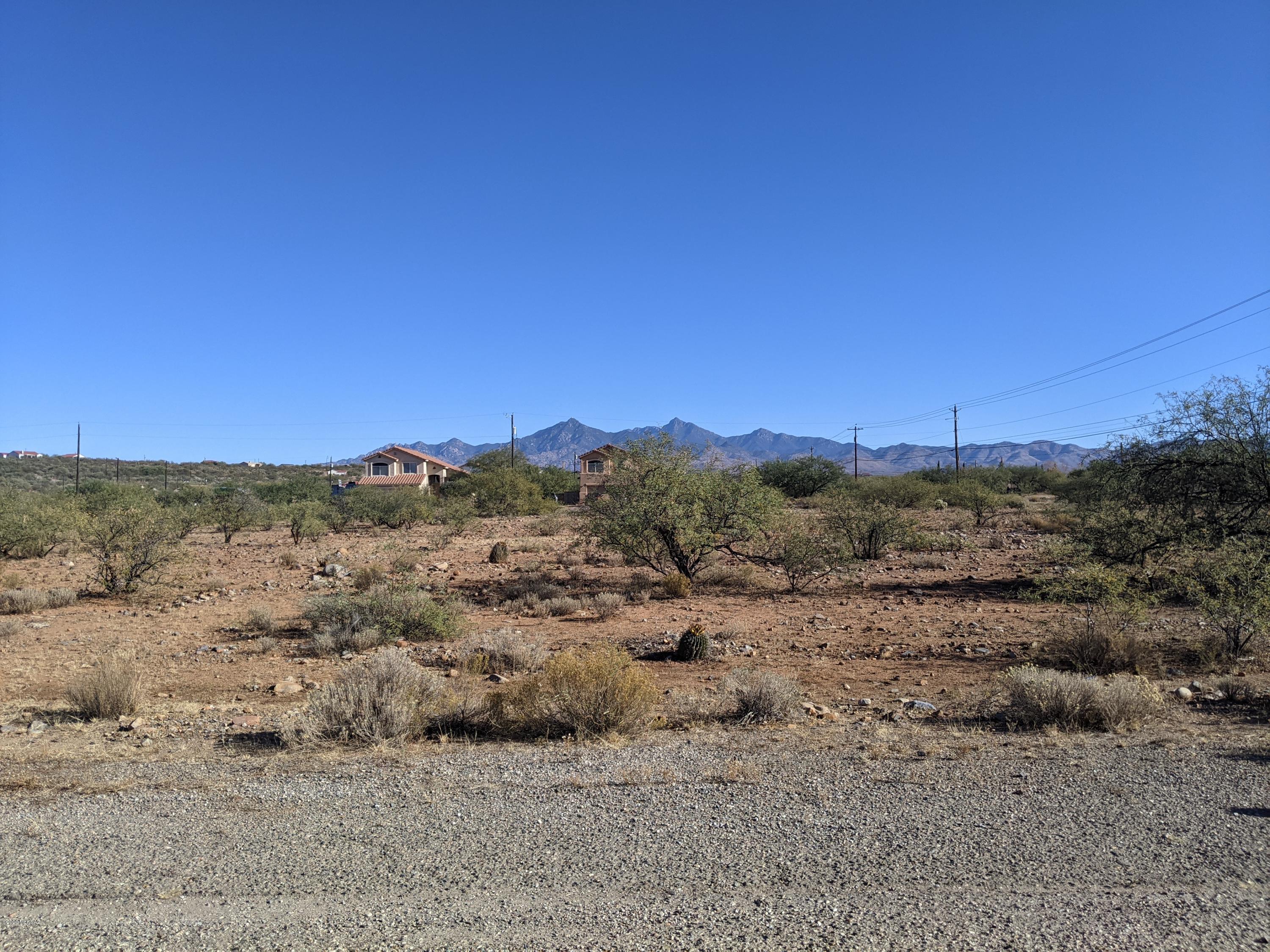 Nice flat easy to build on lot with Electric, water and sewer at the lot line.   Area is very flat with nice mountain views all around.