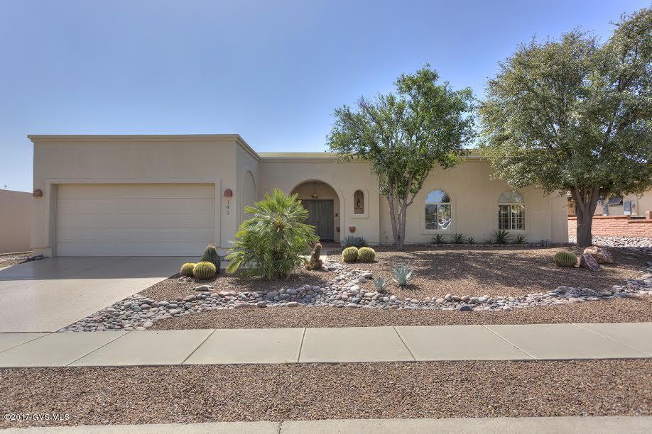 One of kind gorgeous home with distinctive touches throughout! Enter through Southwestern Double French Doors to incredible Custom Home. This home is a unique GEM! Stunning Custom paint with beautiful paint medallion above eating area, wood beams on ceiling in hall, gorgeous honey wood cabinets in kitchen with unique copper plates at each end of skylights - oh yes - 5 Skylights and 2 Solar tubes to bring the gorgeous Arizona light! Enjoy the beautiful sunrise with gorgeous views of the Mountains from the Dining, Living, Master and Back Covered Patio! 2 Master suites.Kitchen has desk area and Hobby Room off kitchen with sink and access to both garage and backyard.Spacious Den/Office office with built-ins.
 Gorgeous Epoxied Driveway and Garage!MOST FURNITURE AVAILABLE BY SBOS