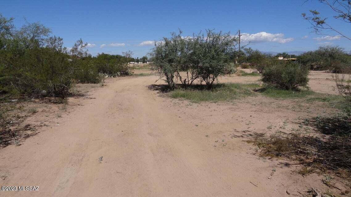 1.31 acres of horse property. City with a rural feel! City water is at home site. Subdivided and may have 2 homes per parcel. Existing Septic and Electric pedestals. Seller will not warrant, certify or perform repairs. Seller may carry with $50k down payment. GO show & SELL!