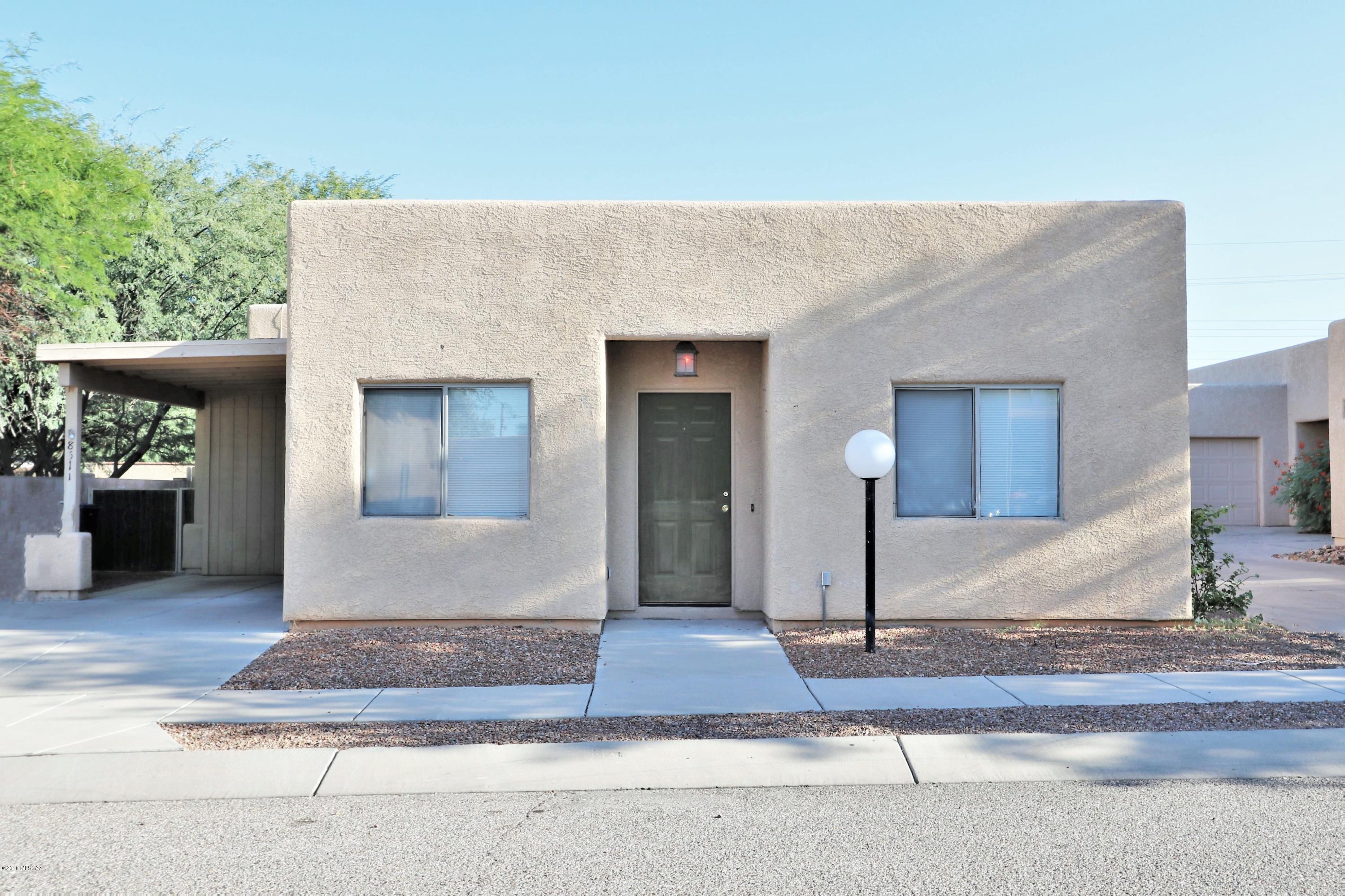Opportunity knocks!  Perfect for Investors, Extended family living, or Live in one unit and rent out the other! This Contemporary Duplex is in move in/rent ready condition!  Great Eastside location close to all the conveniences; Corner Lot on Cul-de-sac with beautiful shady wash on one side! Unit #1 has 2 bedrooms with large walk in closets, 2 baths, private patio & carport with storage. Unit #2 features 3 bedrooms, 2 baths, lovely private, low maintenance back yard, 2 car garage. Don't miss this opportunity-  Come see it today!
