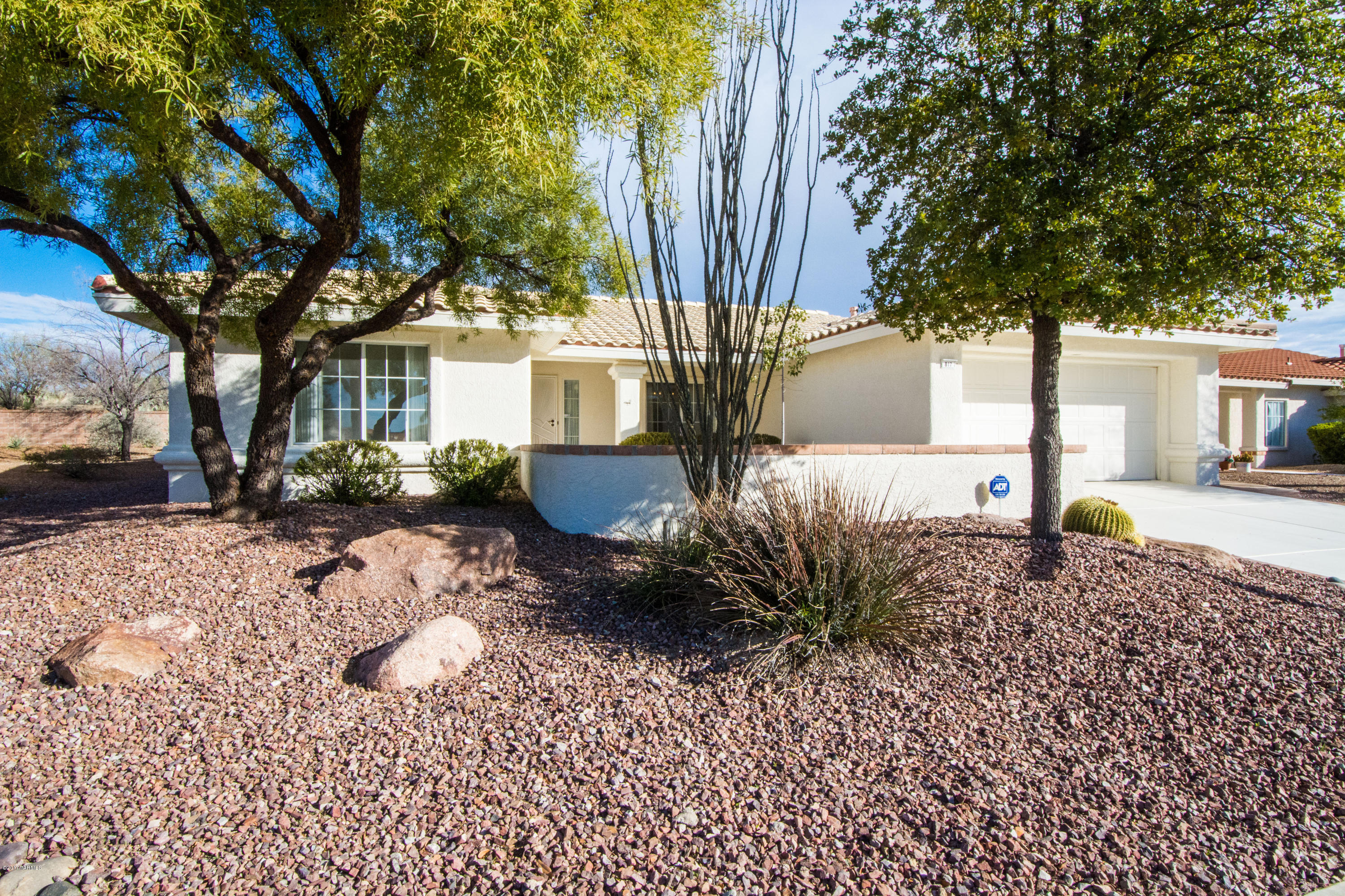 Wow,great price for this lovely Sun City Vistoso home located on a Privacy Lot. Lot Bordering State Owned Land w/no homes behind. Enter this lovely home through the large front courtyard with gate. Included are 2 bedrooms plus den/hobby and a bonus Arizona room. Fabulous backyard w/putting green, fountain and backs to pristine natural desert for privacy. Ceramic tile throughout the home. Home features large Great room, dining area and eat-in kitchen. All appliances as well as newer washer and dryer included and granite counters. Lots of storage and sink in garage, also newer furnace. This is a beautiful Sabino floor plan. Don't miss being the new owner of this fabulous home and enjoying living in Sun City Vistoso. I have been told there are lots of activities to enjoy.