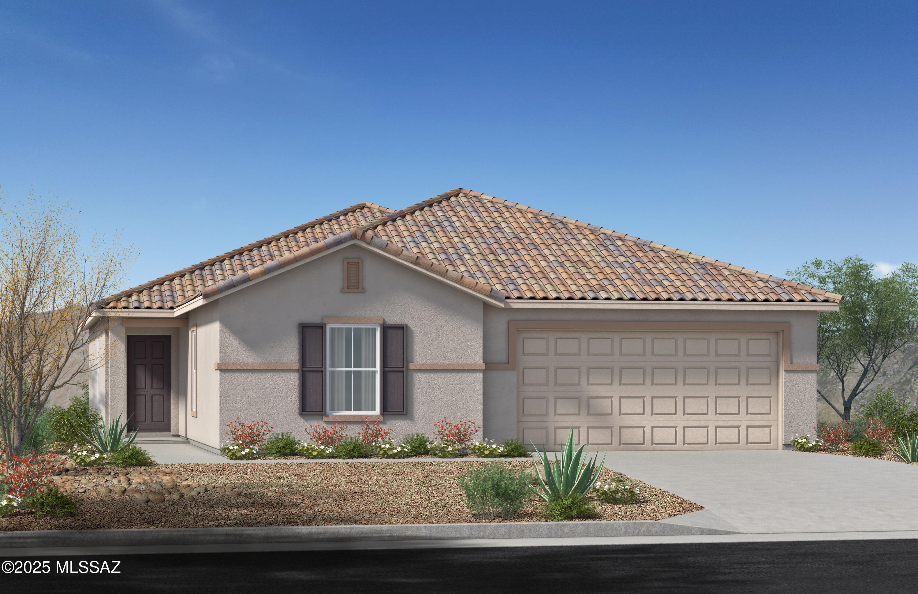 This beautiful, single-story home showcases 9-ft. ceilings and stylish glazed ceramic tile flooring throughout. The expansive great room leads to the covered patio, the ideal setting for outdoor entertaining and leisure. The spacious kitchen boasts 42-in. upper cabinets, stunning granite countertops and top-of-the-line Whirlpool® stainless steel appliances. Relax in the primary suite, which features a walk-in closet, extended dual-sink vanity, and walk-in shower.  Price includes discount predicated on using seller's preferred lender KBHS. Eligible for up to $5k towards rate buy down or closing costs. Must use seller's preferred lender KBHS for financing.