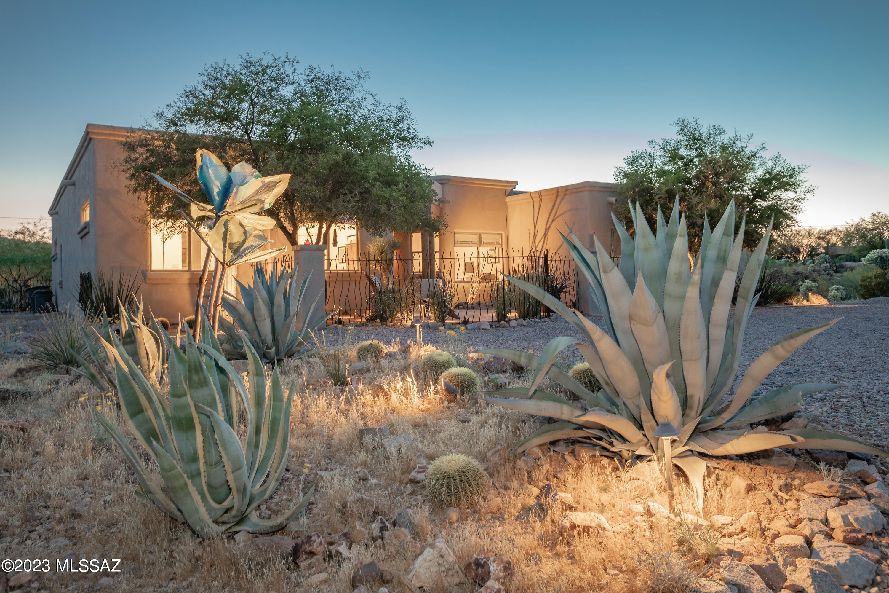 This stunning home is a nature lover's paradise.  Upon entering, you'll see through to the living room with high ceilings, a fireplace and patio doors that frame just one of the many mountain views!  The open family room, kitchen and dining area feature a wall of windows that flood the space with natural light.  Outside you'll find 2 spacious patios-with built in BBQ for entertaining family and friends.  Experience the Sunrise and the Sunsets as they are both incredible.  Beautiful, serene and private inside and out.

OPEN HOUSE CANCELLED FOR SUNDAY.