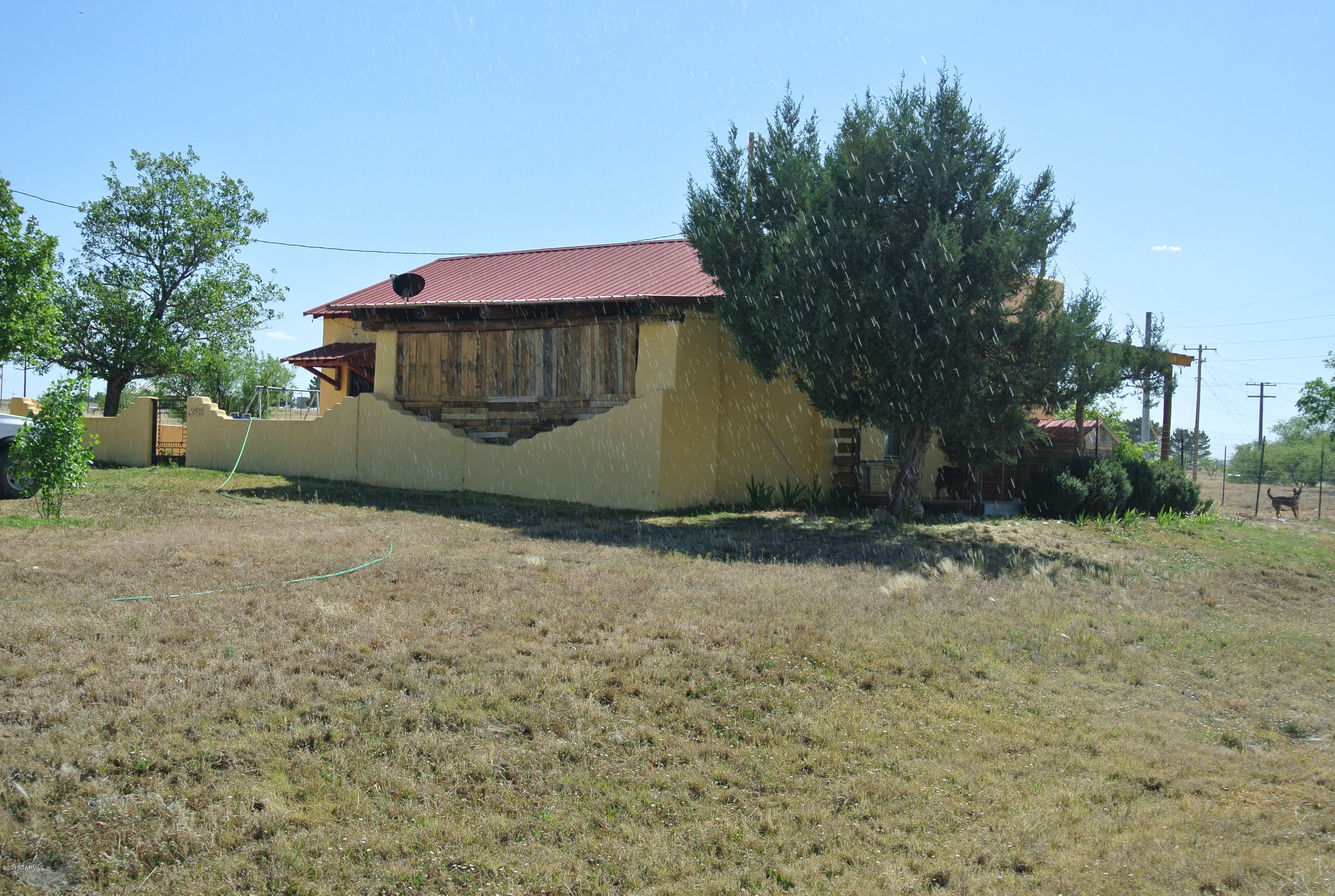 An approximately 12 acre parcel with two rental homes. The larger home, (an historic old mud adobe) rents for $650 per month and the small home rents for $500 per month. The leases are short term. The tenants pay electric.
The bulk of the property could be easily further developed. A nice home with horse facilities with entrance off of Los Encinos road is one possibility. Another would be a tasting room on Los Encinos. 

The property is on a shared well with very good characteristics. However, it is possible to drill a well closer to the homes. 

Plenty of room for horse facilities.

Do not disturb tenants!