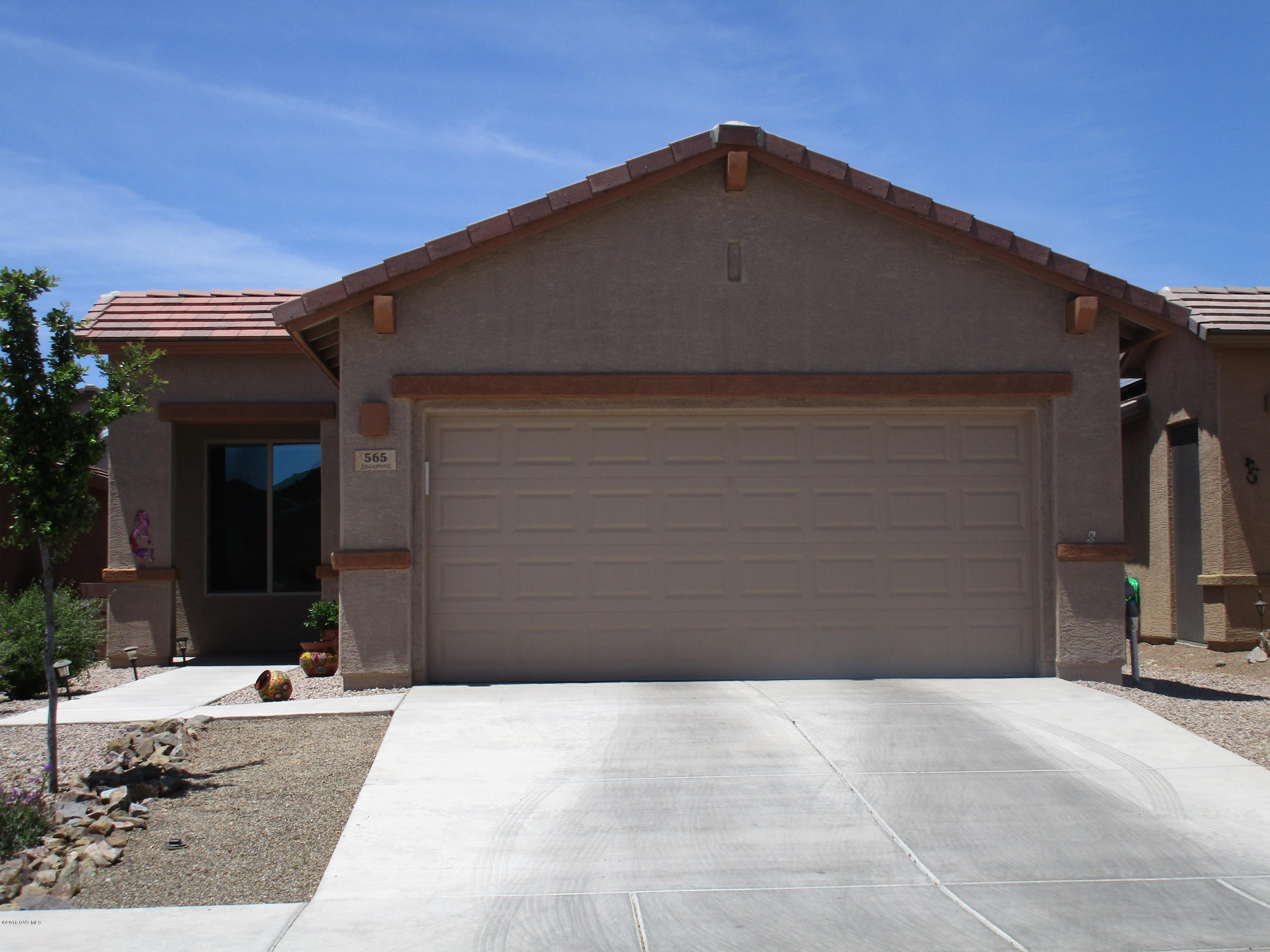 Gorgeous Home! Open Floor Plan! 2 bedrooms, 1 1/4 bathrooms! Beautiful tile! Huge Master Bedroom! Den! Stunning Cabinets! Breakfast nook and Breakfast bar! Sunscreens on windows! Landscaped backyard!