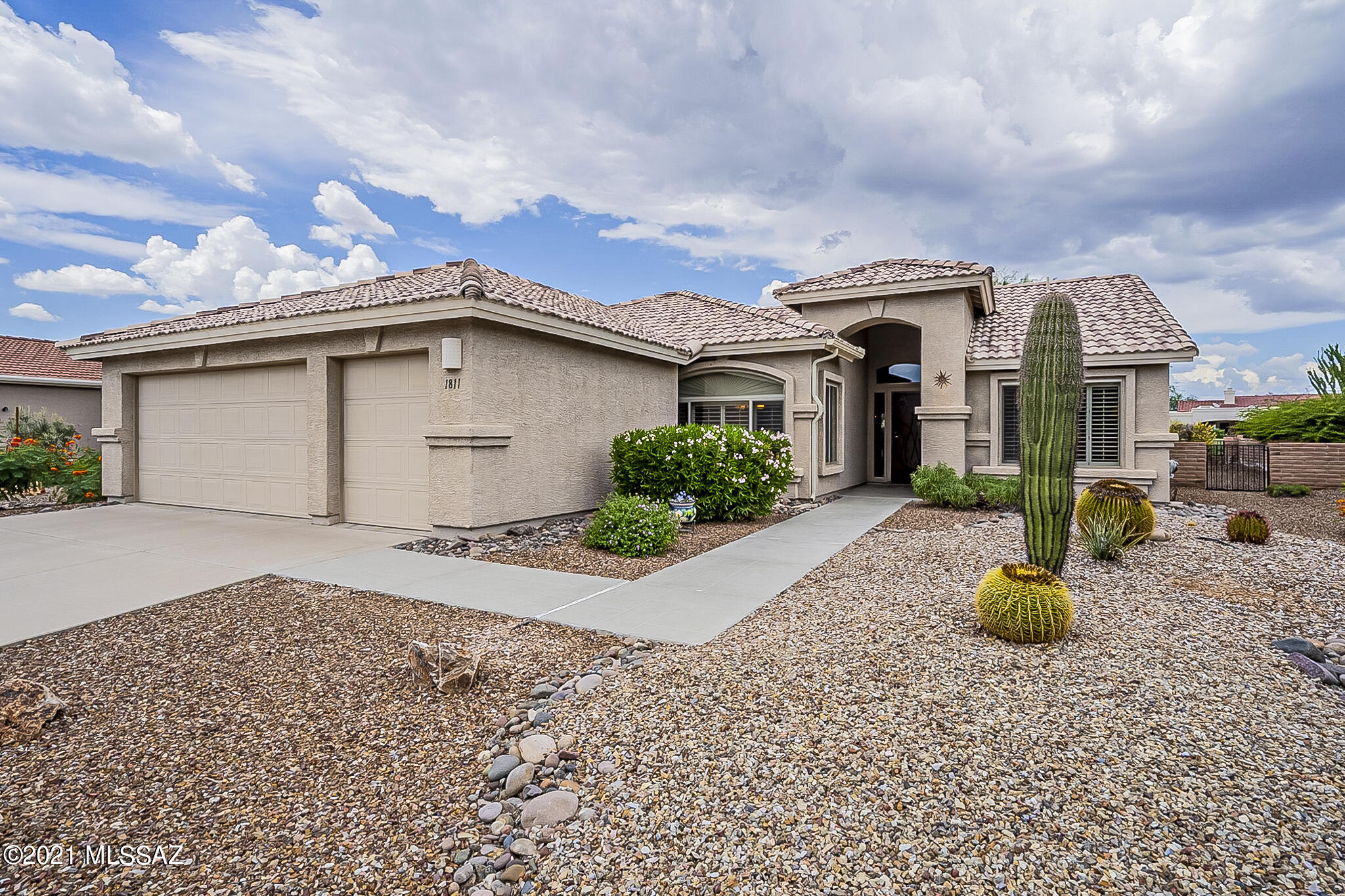 You will love sitting on your Extended, Enclosed, Back Patio because this home is located on the Quail Golf Course Hole #7 with Perfect Orientation, on an Open Lot, ensuring Sunrise and Sunset Views Daily.  This popular 3 Bedroom Laredo model home features 20'' Ceramic Tile,  Gas Range, Kitchen Island, Plantation Shutters, Upgraded Main Shower w/Frosted Glass, Built-in Patio BBQ and lots of decorating venues. Cozy Up on winter nights using the Gas Fireplace located in the Great Room.  There is easy access to your Private Patio from the Slider Door in the Main Bedroom.  2 FT Extended Garage with utility sink.
