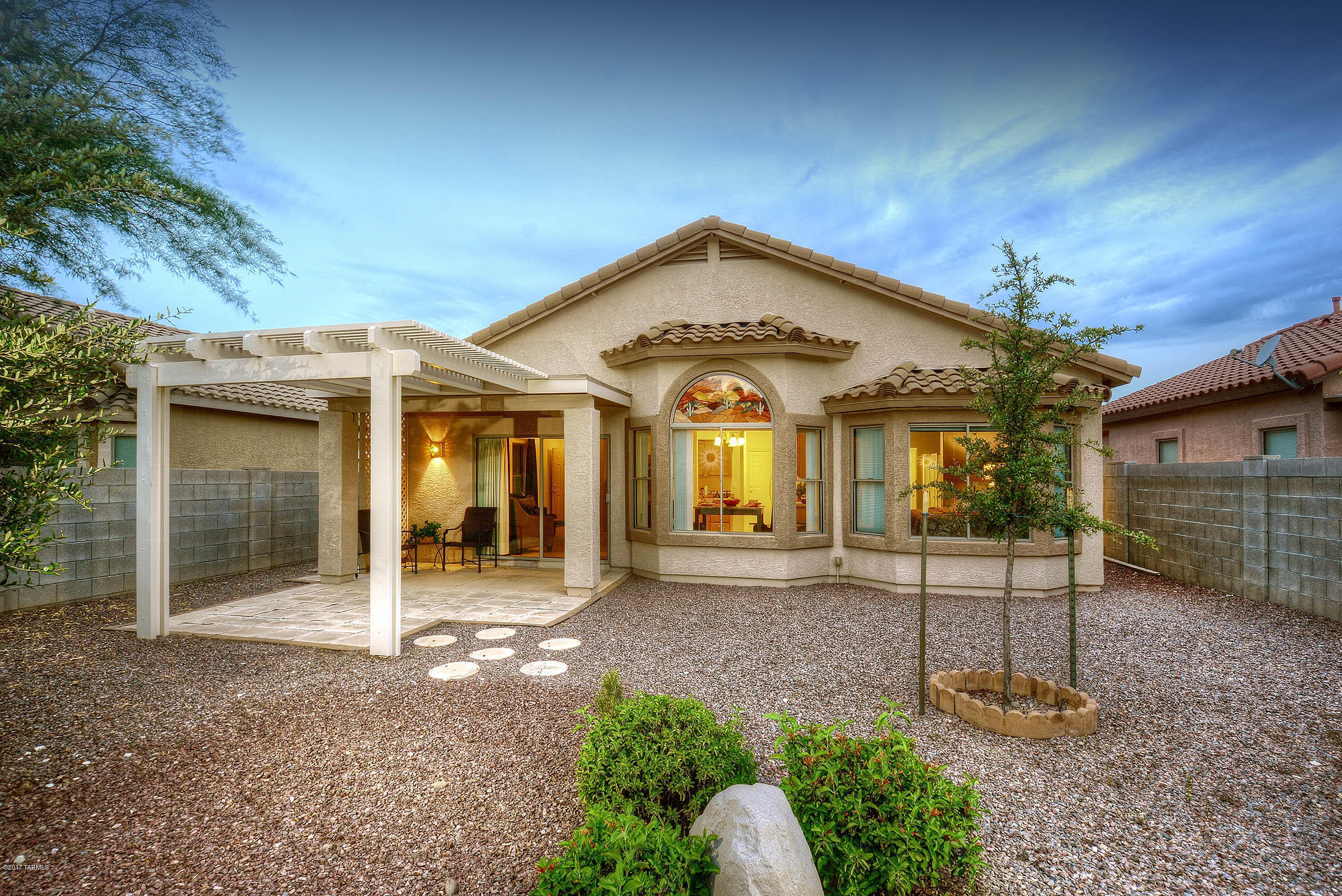 * DESERT GEM* BEAUTIFUL SINGLE LEVEL- NESTLED IN EAGLE CREST! OVERSIZED BCKYD .13 ACRE PLENTY OF ROOM FOR POOL/PLAYAREA/OUTDOOR KITCHEN- WHATEVER YOUR HEART DESIRES!PRIVATE EAST FACING REAR YARD OFFERS SPECTAULAR CATALINA MTN PEAKS, SOOTHING FOUNTAIN, EXTD PERGOLA COVERING, RAISED PRIVACY WALL/PLANTERS- CREATES YOUR OWN DESERT RETREAT!SOARING CEILING- TONS OF WINDOWS MAKE THIS QUALITY BUILT DR HORTON HM AN INCREDIBLE FIND! VERY WELL KEPT- TURN KEY POSSIBILTY ( FURNISHINGS FOR SALE*)GREAT INVESTMENT/INCOME PROPERTY TOO! ''GREAT RM CONCEPT'' OPENS TO KIT- SLIDERS LEADING TO HUGE BACKYARD!UPGRADED LIGHTING,FANS,TILE & NEWER CARPET, SPLIT BR PLAN! GREEN FRIENDLY- 2X6 CONSTR W/REFLECTIVE BARRIER IN CEILING!4 FT EXTD- EPOXY PAINTED GARAGE W/WORK SINK!GREAT COMMUNITY- PARKS,BALLFIELD,SIDEWALKS!!