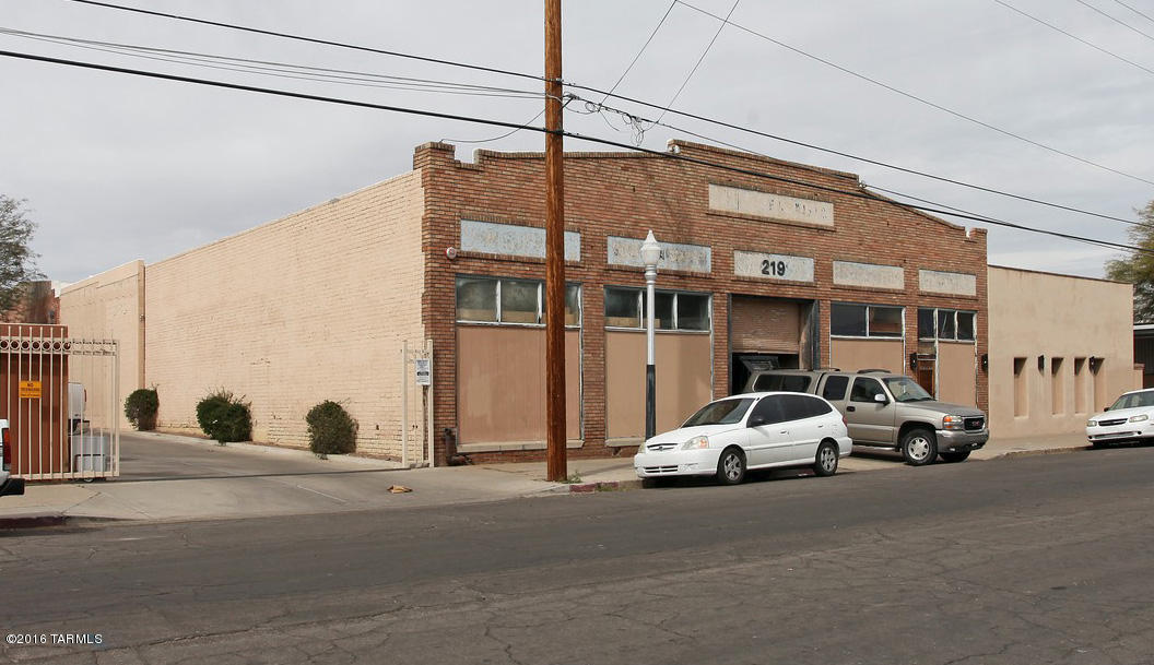 Currently a cabinet shop.  Ideal manufacturing building or warehouse in the middle of town just off 4th Ave.  HVAC in the office area and evaporative cooling in the shop.  Masonry wall fence around yard area.