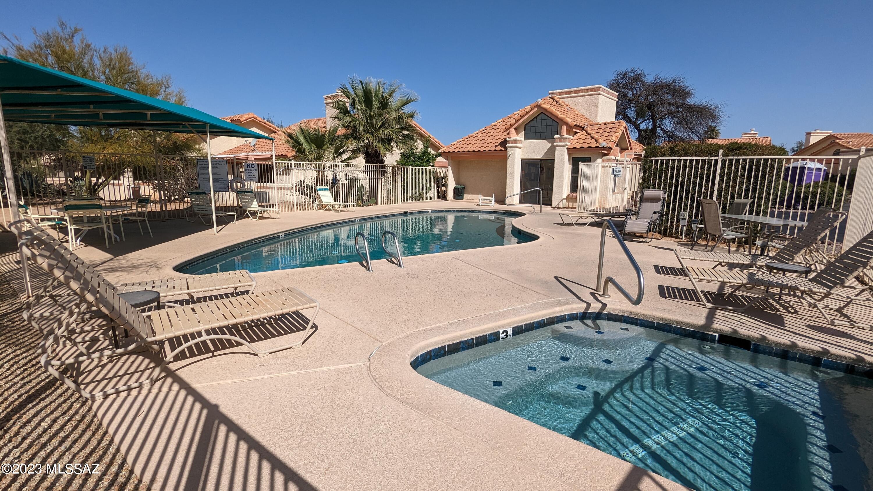 Very Spacious, Open and Bright, UNFURNISHED Two Bedroom/Two Bath townhouse tucked back just west of Oracle Rd across from the El Conquistador Resort.
Beautifully updated with Granite Counter tops, Stainless Appliances- including Washer and Dryer, Two-car garage, HIGH Ceilings, Gas Fireplace, and more! East patio backs to open desert common area. Coummunity pool and spa too! We do FLEXIBLE LEASES, and also LONG-TERM- what do you need? Are you building or shopping for your own home- give us a call today!
PLEASE NOTE: This is an UNFURNISHED home- we are showing furnished photos to help you get a better feel for the floor plan! Don't miss this one!