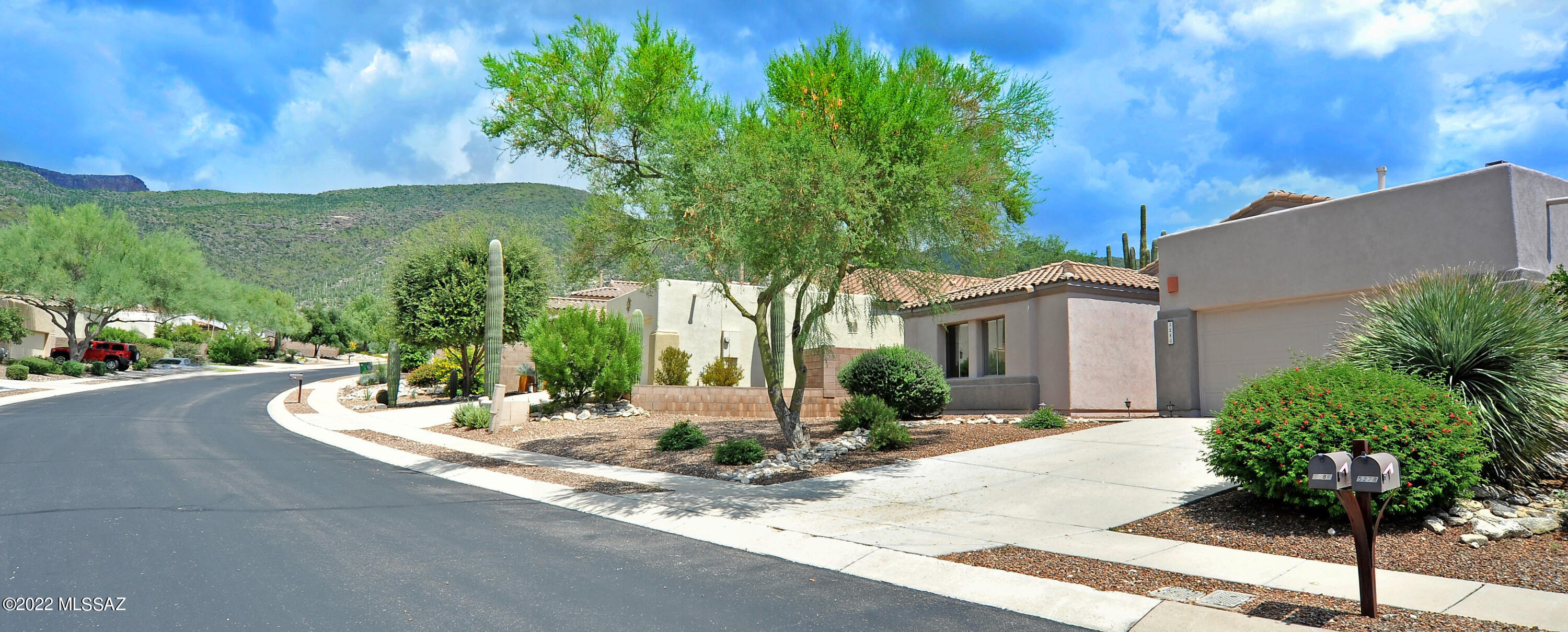 Sabino Springs 3 Bedroom 2 Bath+Den/Office in Northeast Tucson. Sabino Springs is a serene Gated Golf Course Community at the base of the Catalina Mountains and is home to the Robert Trent Jones Jr designed Arizona National Golf Club. This property is located just West of Par 3 Hole #12. Although it is on the course, the yard is very private due to natural landscaping and open desert between the house and the course. Inviting front entry leads to a bright main living area that overlooks the pool, has vaulted ceilings and a gas fireplace. The kitchen has cherry cabinets, a wall oven and has sight-lines into the dining and living areas. Split bedroom floor plan. The primary suite has two closets and private access to the yard space. The primary bathroom has dual sink vanity as well as a separate shower and garden tub. Relax in the Pebble-tec pool or enjoy the mountain views from the paved red brick area.