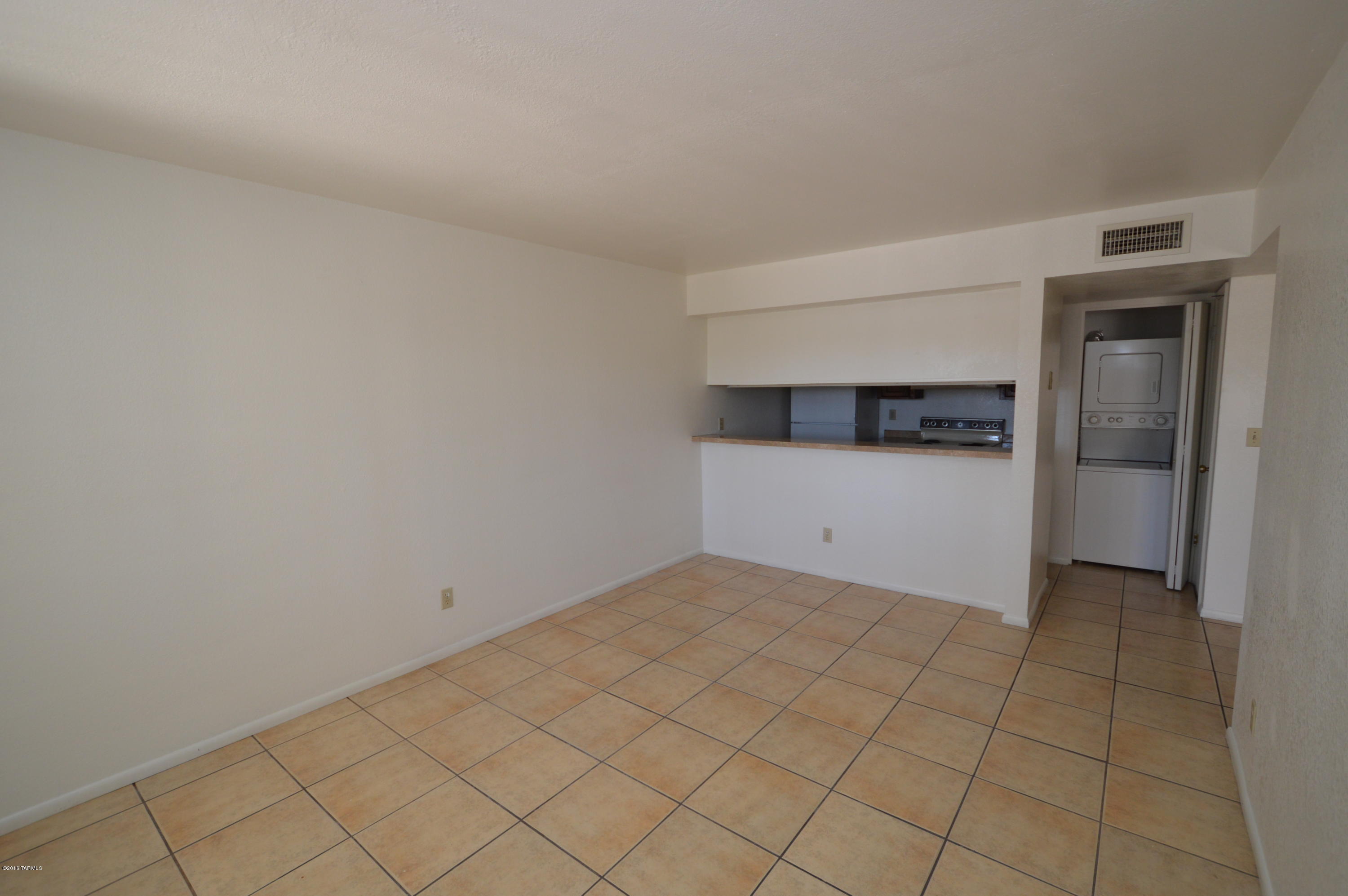 Fabulous first floor 2BR, 2BA condo! Spacious living room overlooked by galley style kitchen with lots of cabinet space! Tile flooring in common and traffic areas, and comfortable carpeting in bedrooms! Get access to the community pool and clubhouse too! Covered parking! Don't miss out on this great deal! CALL TODAY!
