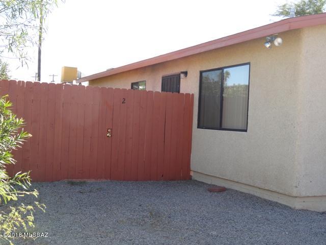 Two 3 bedroom homes on one lot near the University of Arizona. 

The first is a spacious 3 bedroom 2 bath brick home with ample living space and separate entrance to master bedroom.So it's great for an investment property or single family home. 

Both units are leased and in great condition. Front home is brick with 3BR, 1 3/4 bath with  
 

The Back house - 
Is an updated 3 Bedroom Private Home in rear of property which boast approx. 1000 (sq.ft.) The home features include newer tile throughout, bright open bedrooms, washer and dryer, cute kitchen and small enclosed yard. 
Built in 1988