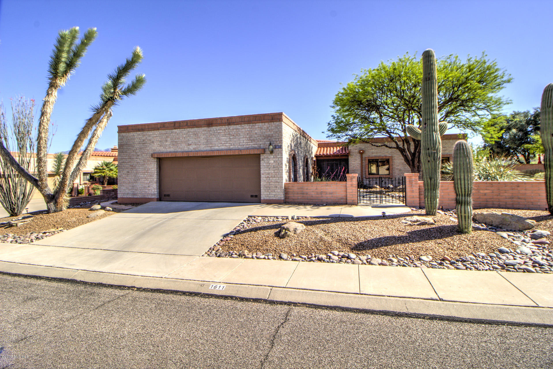 WOW Factor view, highly desirable Granada model, 3 BR, 2 bath, 2 car garage, slump block construction (energy efficient). One owner home with numerous modifications at time of construction separates this from the norm. This combination of quality and view don't come along often. You snooze, you loose.