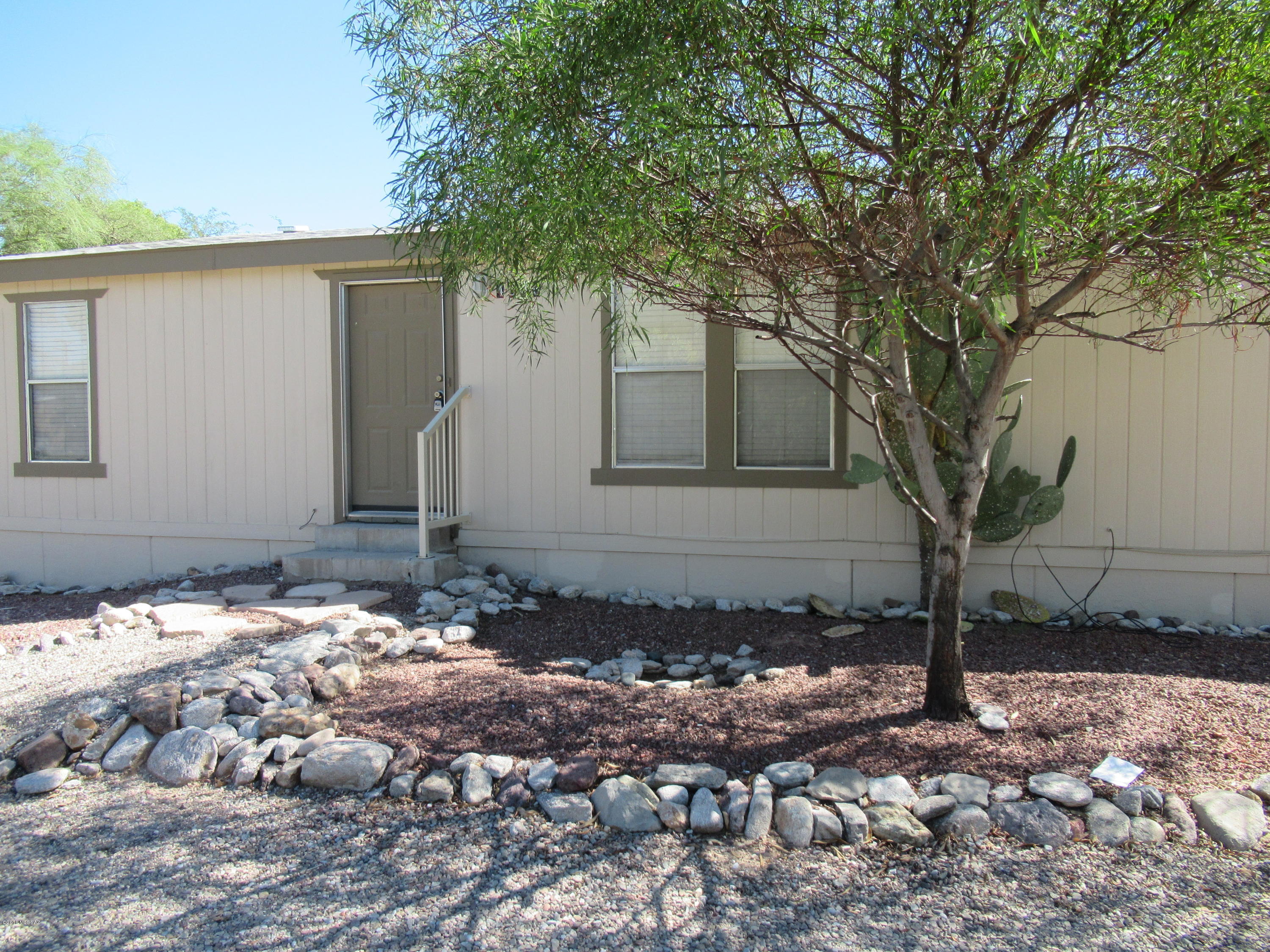 Speedway & Swan area - Centrally located manufactured home, 3 bedroom, 2 bathrooms across the street from a city park. New interior paint and new top grade wood grain vinyl flooring throughout. Eat In Kitchen features refrigerator and gas stove (no dishwasher, m/w or garbage disposal). Split bedroom floor plan. Master bedroom suite includes walk in closet and nice size master bathroom. Laundry room off kitchen with w/d hook ups (electric dryer hook up only). Two assigned off street parking spaces.