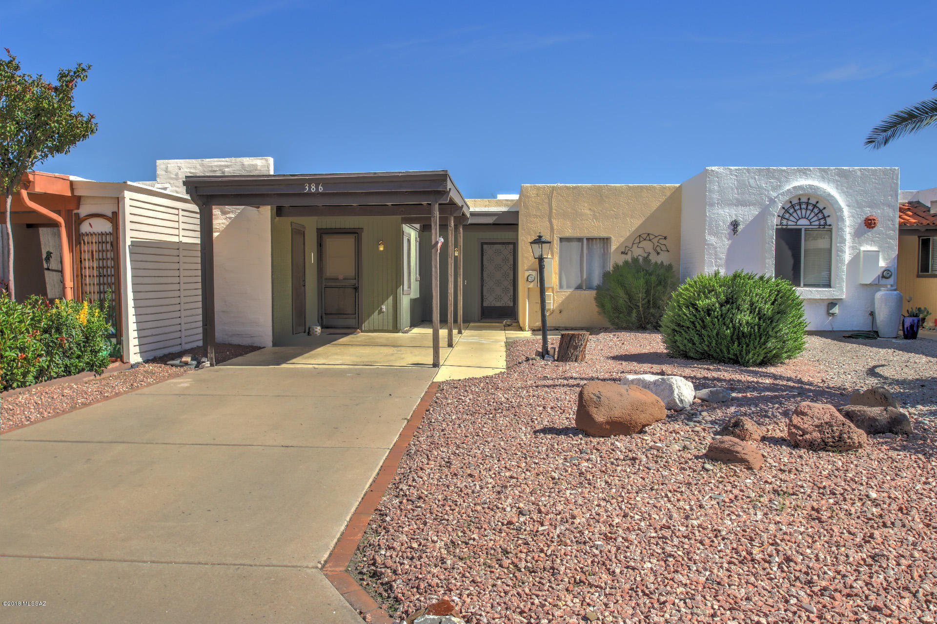 This townhouse is ready for your personal
touch, make it special.  Two bedrooms, one
bath, large closets, additional storage off
the front and rear patios. No refrig.  Carport
and driveway will take care 2 cars.