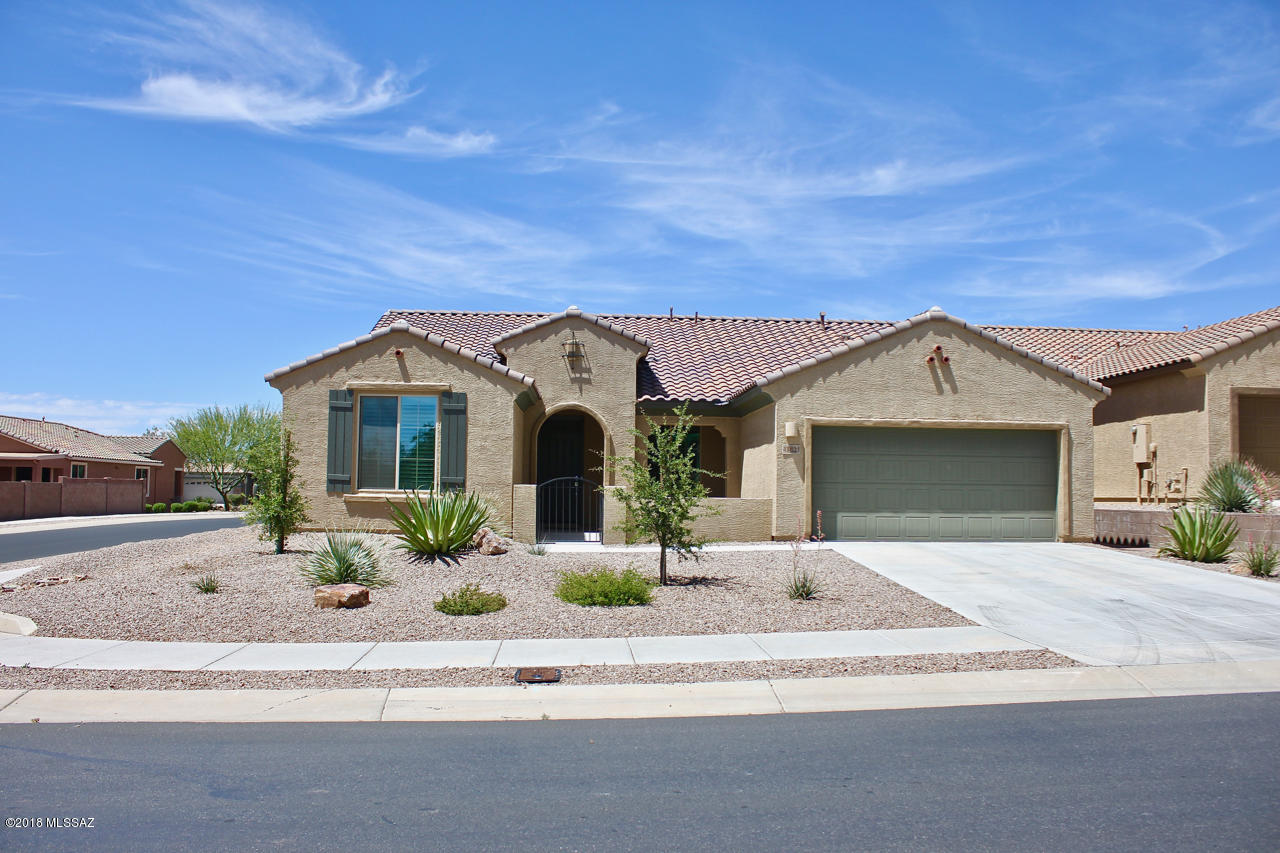 Del Webb at Rancho Del Lago.  Here you'll find a community built for lifestyle and convenience – high energy efficiency construction and low maintenance means you can concentrate on the activities galore offered in this active community! Wonderful upscale finishes  starting with the gourmet kitchen with oversized island, stainless steel appliances and granite countertops.  Open concept floorplan is perfect for entertaining a crowd or just enjoying a quiet evening. Generous owner's suite with spacious bath & large walk-in closet. This is a true 3 Bedroom home with additional Den/Office. Further enhanced with plantation shutters installed throughout & professionally  landscaped front and back yards. Top notch Active Adult Community, like living in a resort!