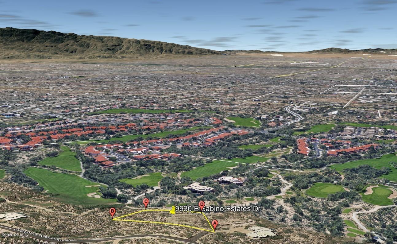 Wonderful lot featuring panoramic city and mountain views. This property is tucked away within the gated area of the Sabino Springs community that overlooks the Arizona National Golf Course. Beautiful Saguaros abound on this desert lush lot surrounded by active wildlife trails. Community features wonderful walking trails, pool/workout room, and clubhouse. This lot has been platted to accommodate a 2831 sqft Greg Simmons' designed contemporary with 4 bedrooms, 4 baths, and a 3 car garage...see pictures for floorplan. Seller financing available with 20-25% down!