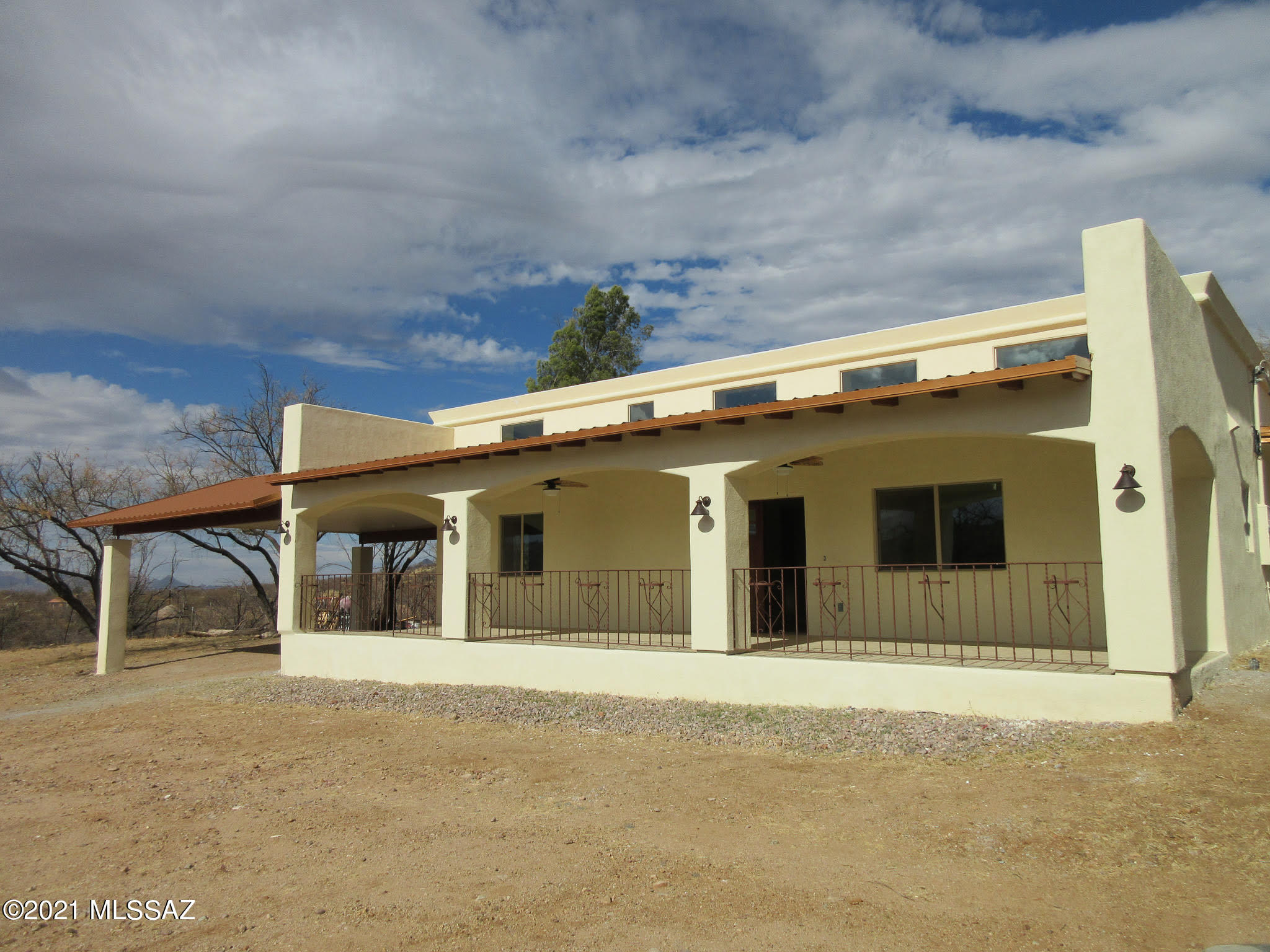 Horse property ! This gorgeous newly remodel home offer's a tranquil ranch living. Sitting on 10.27.  Acres . This beautiful home features 3/BR 2/BA, wood beam ceilings, tile throughout out all living areas, granite countertops, a huge custom stack stone fireplace located in the family room. This is a one of a kind property, a must-see!