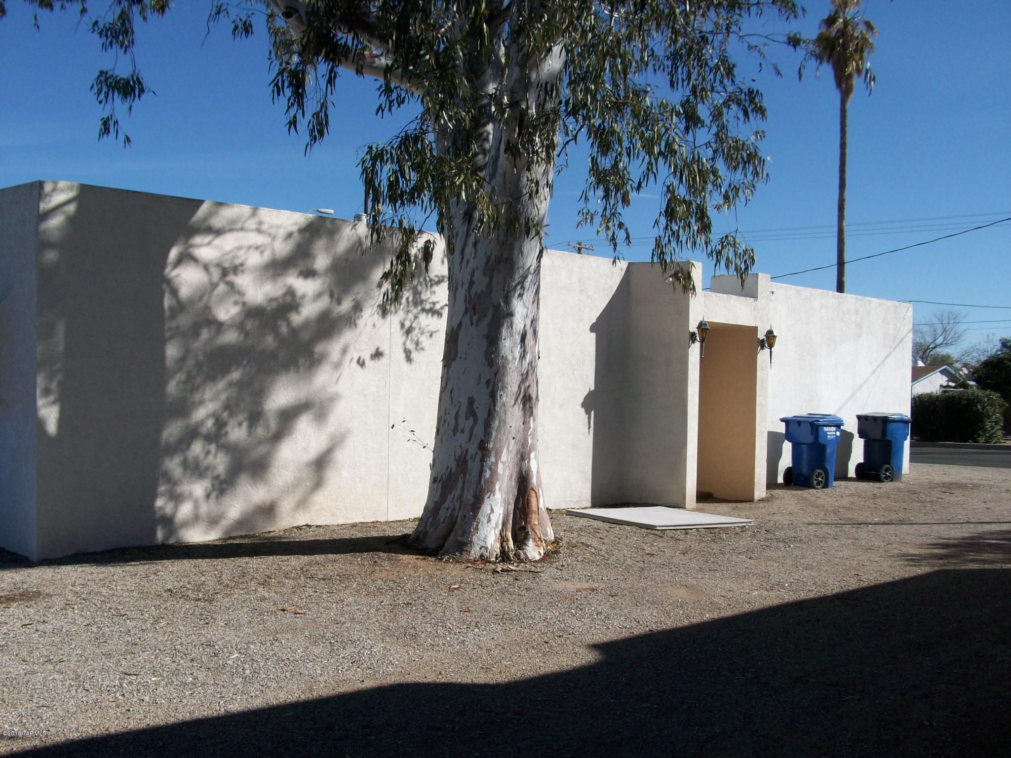 Custom finishes available - this area is being redeveloped and is a great location for your office, business or investment property. One side rented with good income - other side vacant for owner occupant or tenant. Large building with room for multiple uses.  Plenty of parking.  Convenient to all parts of Tucson. Please call for an appointment.