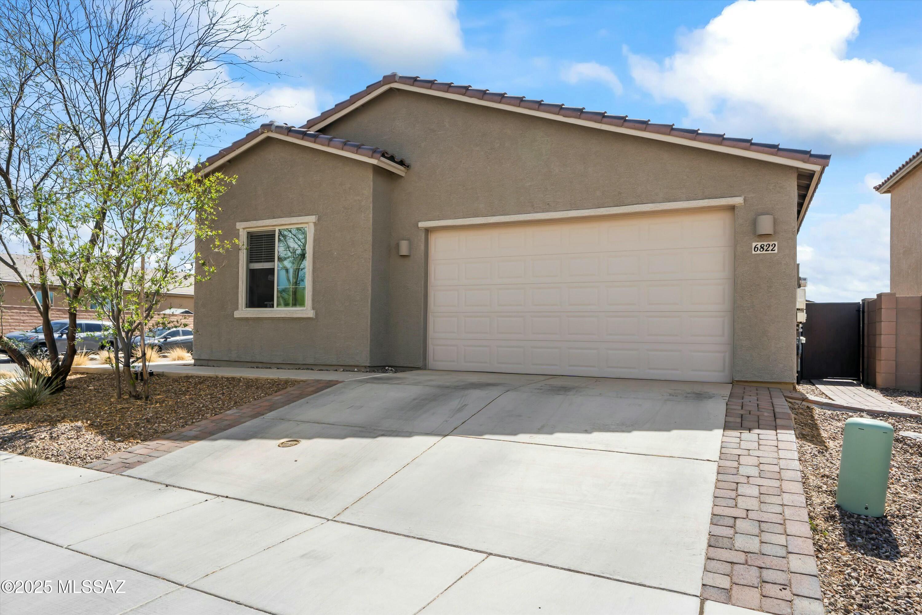 Popular Molino Floor Plan on Corner Lot! Single story, great room and split bedroom layout with high ceilings. Beautiful kitchen with granite countertops, cherry java 42'' cabinets, gas range and large island. Primary bathroom has a walk-in shower and double vanity in granite. Energy efficient LED lighting, dual pane low-E windows and Honeywell smart thermostat. Spacious backyard with artificial turf and decorative gravel for easy, low maintenance. Located in the amazing community of La Estancia, which offers a community pool, pickleball courts, parks, a waterpad and much more! Located in the award winning Vail School District.