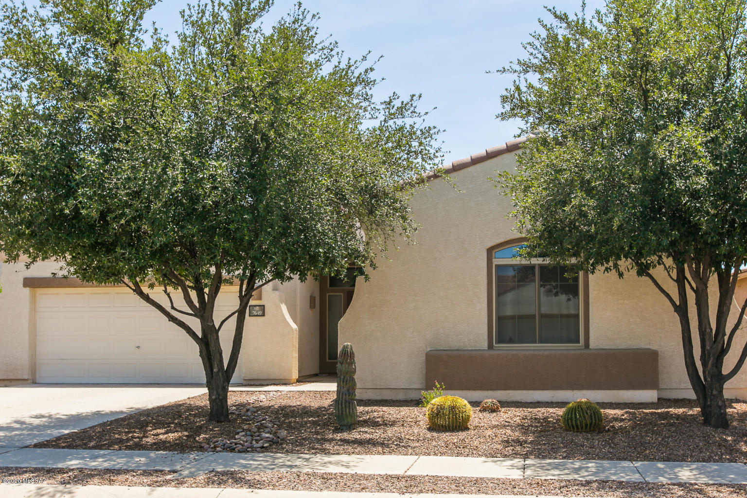 This 4 bedroom home boasts of upgrades. Granite counters , new tile Stainless appliances, bay window, ceiling fans, security doors and more. Enjoy NW Tucson in of the community pools or recreation at one of the parks.