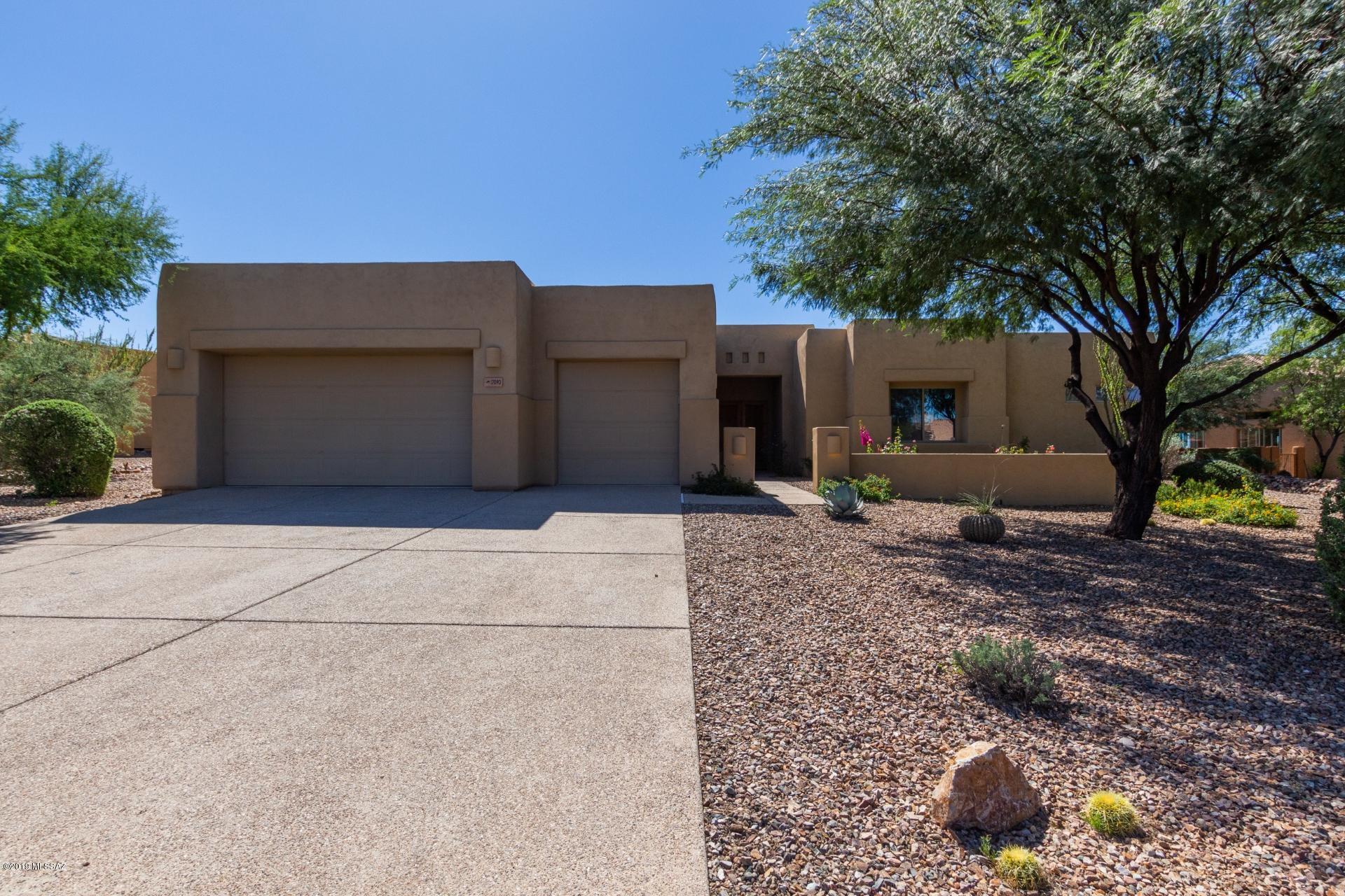 Stunning 5 bed, 4 bath territorial style home located on 1/3 of an acre in highly sought after Vail community. Impressive outdoor space offers a covered patio, sparkling pool and spa & no rear neighbors allowing for privacy and breathtaking mountain views. Immaculate interior boasts separate living and family rooms, soaring ceilings, gleaming diagonal tile, built in shelving, a 2 sided family room/patio fireplace and large windows for sweeping views. Designed for entertaining, the open concept kitchen presents granite counters, ss appliances, stylish custom cabinetry & a large island with breakfast bar seating. Lavish spa inspired master ensuite features a walk-in glass block shower, a gorgeous tiled soaking tub and dual vanities. List agent related to seller. Seller is licensed AZ realtor